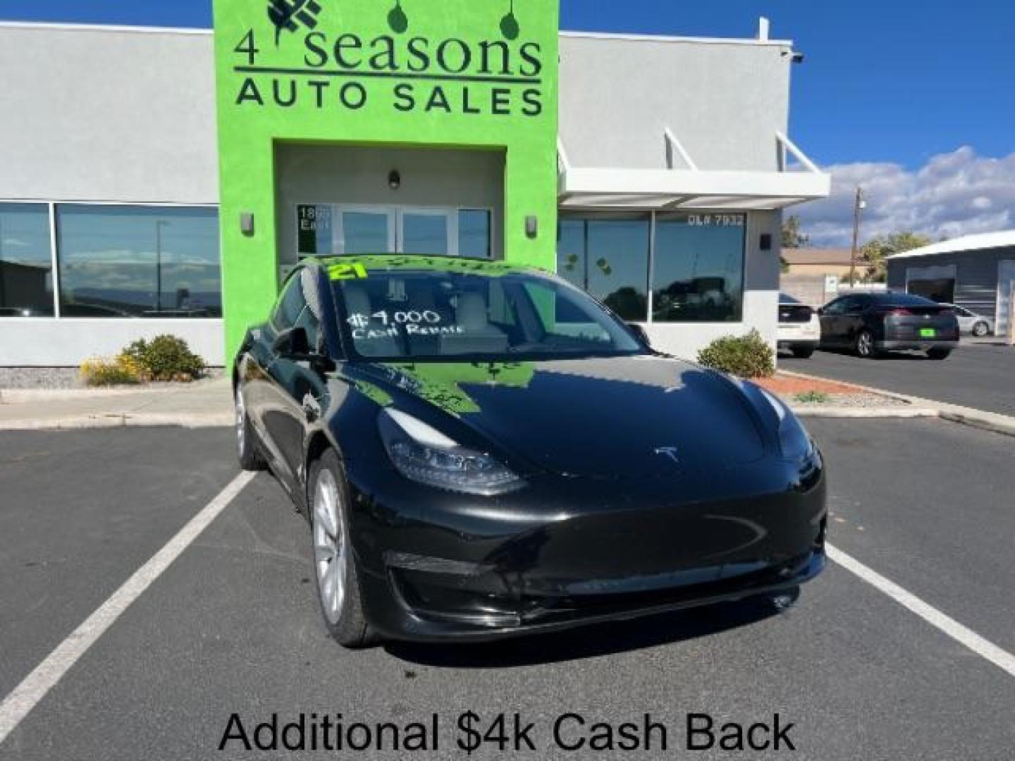 2021 Solid Black /Black and White Tesla Model 3 Long Range (5YJ3E1EB9MF) with an ELECTRIC engine, 1-Speed Automatic transmission, located at 1865 East Red Hills Pkwy, St. George, 84770, (435) 628-0023, 37.120850, -113.543640 - Photo#0