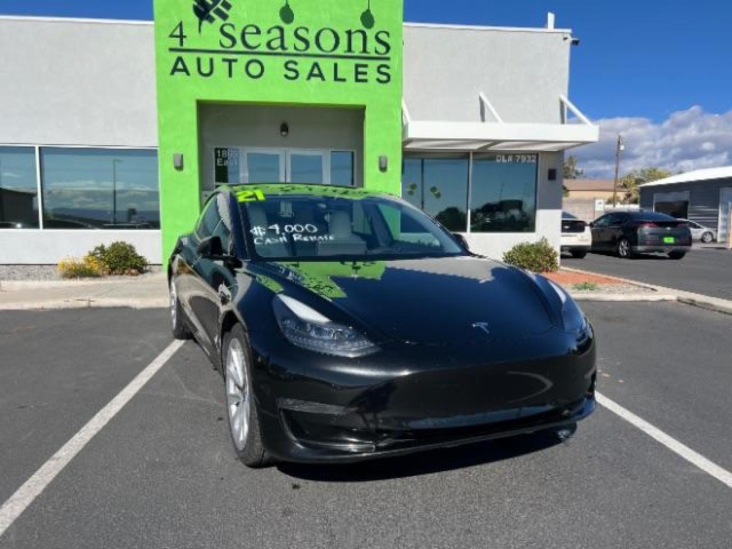 2021 Solid Black /Black and White Tesla Model 3 Long Range (5YJ3E1EB9MF) with an ELECTRIC engine, 1-Speed Automatic transmission, located at 1865 East Red Hills Pkwy, St. George, 84770, (435) 628-0023, 37.120850, -113.543640 - Photo#1