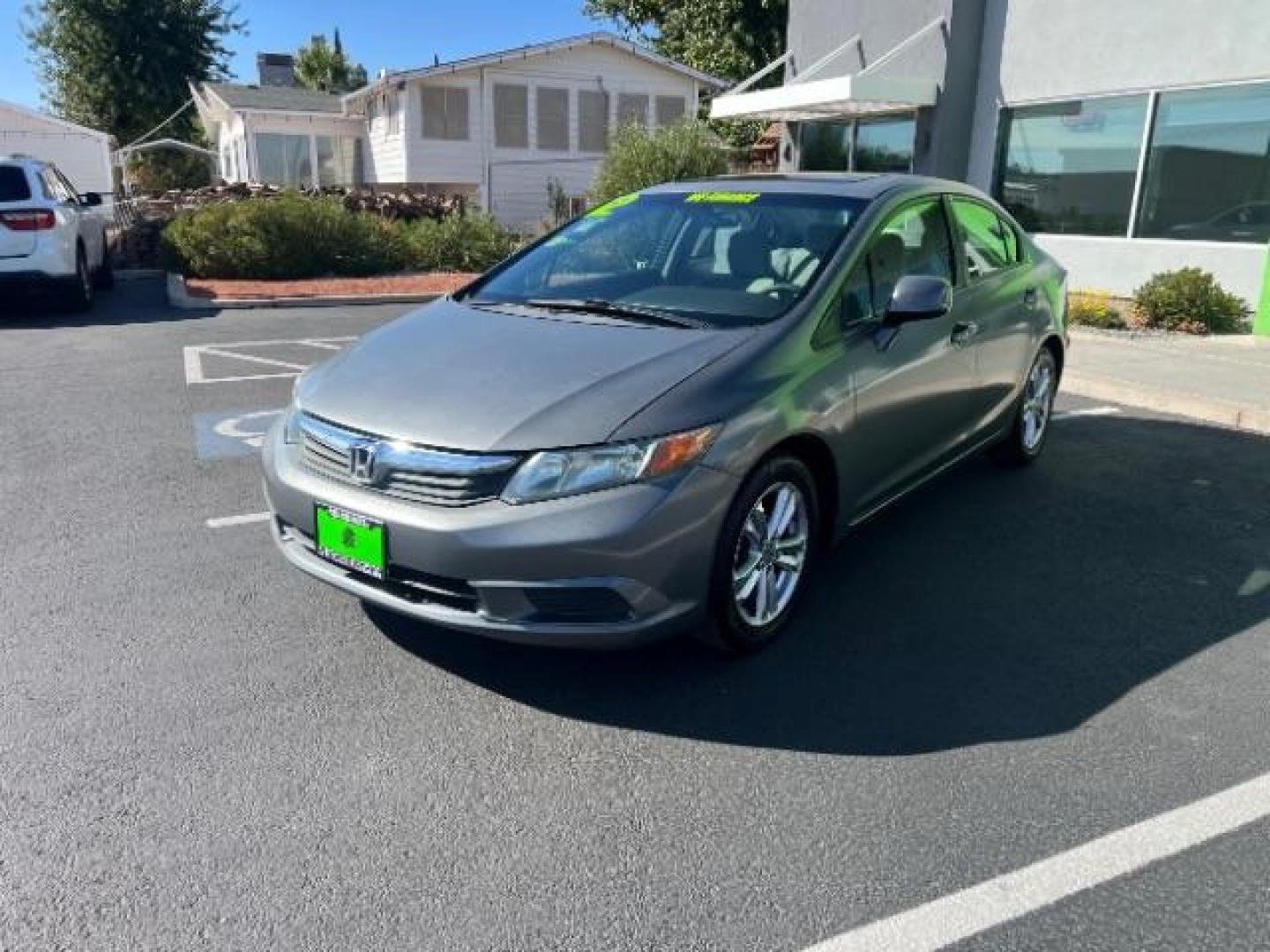 2012 Urban Titanium Metallic /Stone Cloth Interior Honda Civic EX Sedan 5-Speed AT (2HGFB2F8XCH) with an 1.8L L4 SOHC 16V engine, 5-Speed Automatic transmission, located at 1865 East Red Hills Pkwy, St. George, 84770, (435) 628-0023, 37.120850, -113.543640 - We specialize in helping ALL people get the best financing available. No matter your credit score, good, bad or none we can get you an amazing rate. Had a bankruptcy, divorce, or repossessions? We give you the green light to get your credit back on the road. Low down and affordable payments that fit - Photo#2