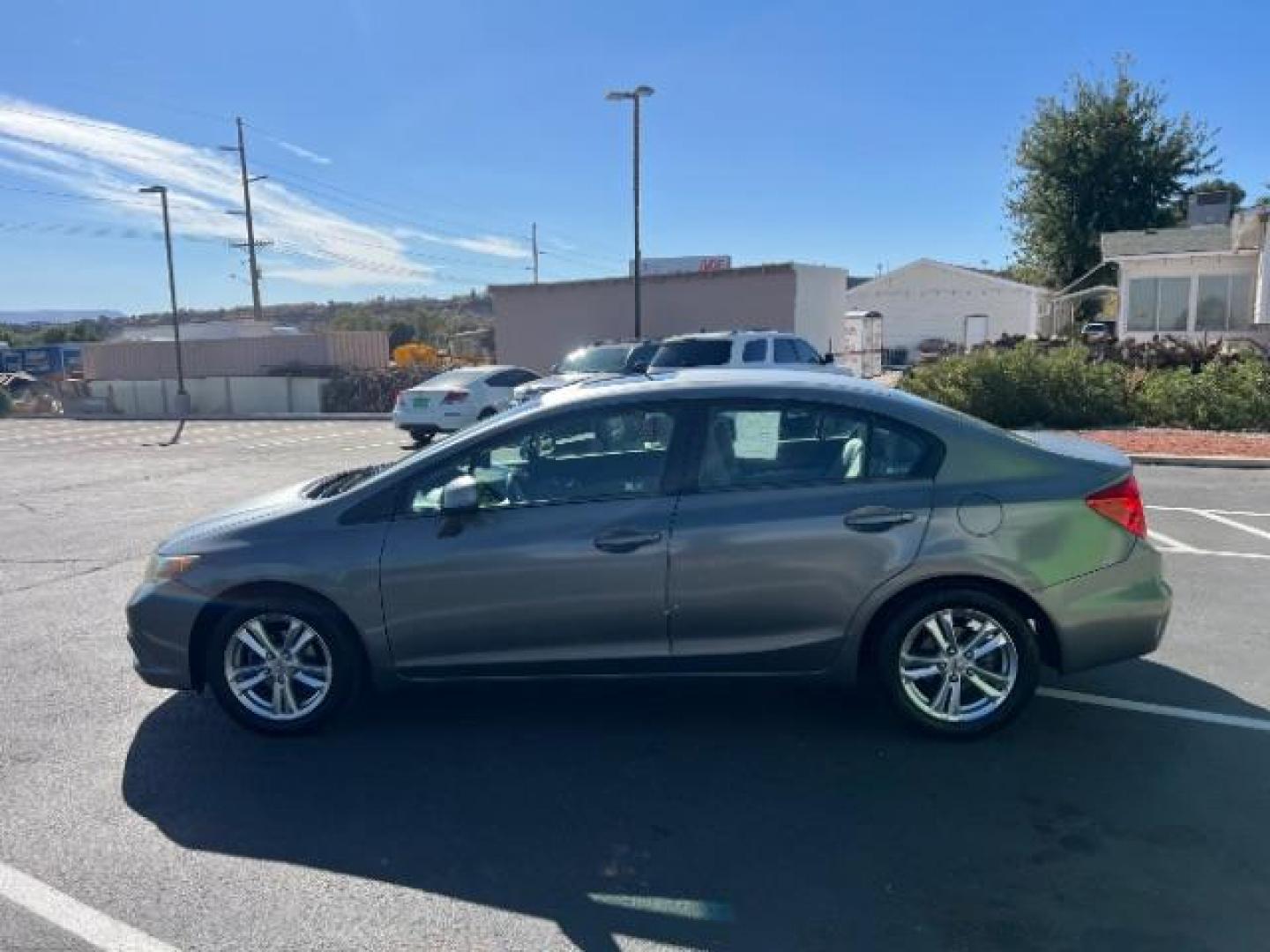 2012 Urban Titanium Metallic /Stone Cloth Interior Honda Civic EX Sedan 5-Speed AT (2HGFB2F8XCH) with an 1.8L L4 SOHC 16V engine, 5-Speed Automatic transmission, located at 1865 East Red Hills Pkwy, St. George, 84770, (435) 628-0023, 37.120850, -113.543640 - We specialize in helping ALL people get the best financing available. No matter your credit score, good, bad or none we can get you an amazing rate. Had a bankruptcy, divorce, or repossessions? We give you the green light to get your credit back on the road. Low down and affordable payments that fit - Photo#3