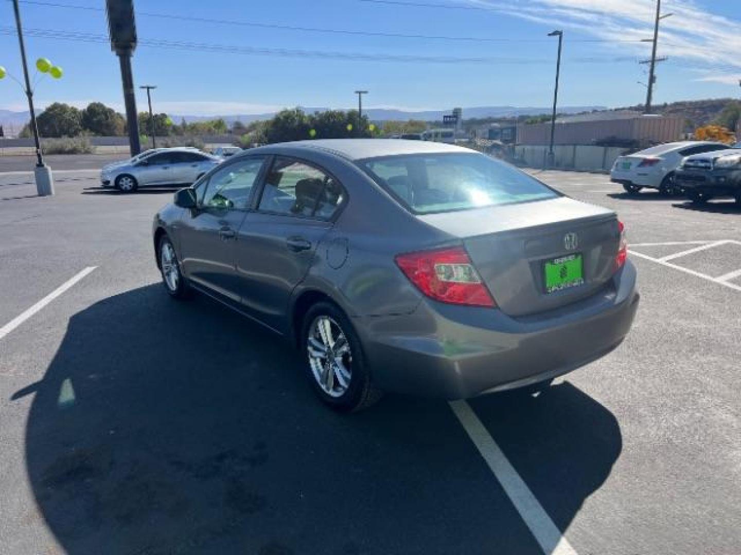 2012 Urban Titanium Metallic /Stone Cloth Interior Honda Civic EX Sedan 5-Speed AT (2HGFB2F8XCH) with an 1.8L L4 SOHC 16V engine, 5-Speed Automatic transmission, located at 1865 East Red Hills Pkwy, St. George, 84770, (435) 628-0023, 37.120850, -113.543640 - We specialize in helping ALL people get the best financing available. No matter your credit score, good, bad or none we can get you an amazing rate. Had a bankruptcy, divorce, or repossessions? We give you the green light to get your credit back on the road. Low down and affordable payments that fit - Photo#4