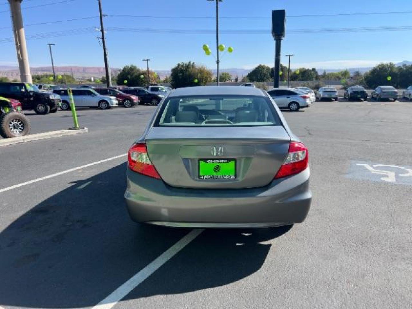 2012 Urban Titanium Metallic /Stone Cloth Interior Honda Civic EX Sedan 5-Speed AT (2HGFB2F8XCH) with an 1.8L L4 SOHC 16V engine, 5-Speed Automatic transmission, located at 1865 East Red Hills Pkwy, St. George, 84770, (435) 628-0023, 37.120850, -113.543640 - We specialize in helping ALL people get the best financing available. No matter your credit score, good, bad or none we can get you an amazing rate. Had a bankruptcy, divorce, or repossessions? We give you the green light to get your credit back on the road. Low down and affordable payments that fit - Photo#5