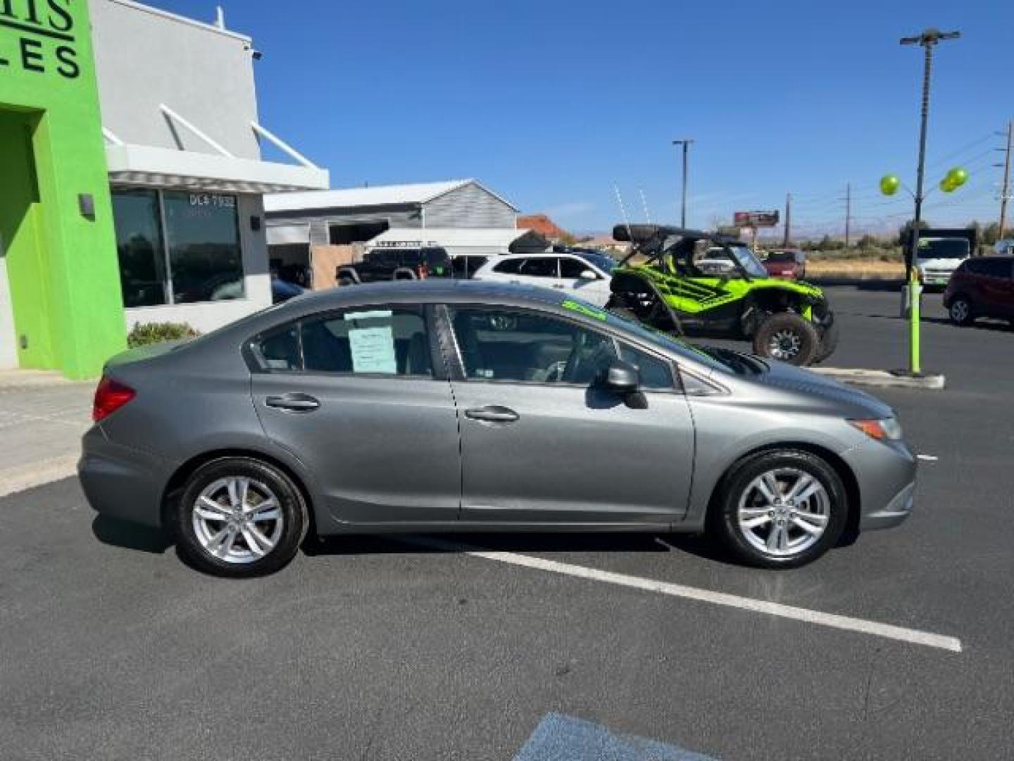 2012 Urban Titanium Metallic /Stone Cloth Interior Honda Civic EX Sedan 5-Speed AT (2HGFB2F8XCH) with an 1.8L L4 SOHC 16V engine, 5-Speed Automatic transmission, located at 1865 East Red Hills Pkwy, St. George, 84770, (435) 628-0023, 37.120850, -113.543640 - We specialize in helping ALL people get the best financing available. No matter your credit score, good, bad or none we can get you an amazing rate. Had a bankruptcy, divorce, or repossessions? We give you the green light to get your credit back on the road. Low down and affordable payments that fit - Photo#7