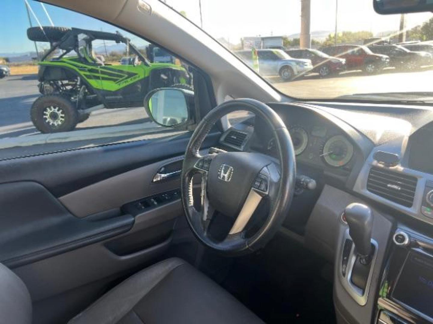 2014 White Diamond Pearl /Gray Honda Odyssey EX-L (5FNRL5H60EB) with an 3.5L V6 SOHC 24V engine, 6-Speed Automatic transmission, located at 1865 East Red Hills Pkwy, St. George, 84770, (435) 628-0023, 37.120850, -113.543640 - Photo#30