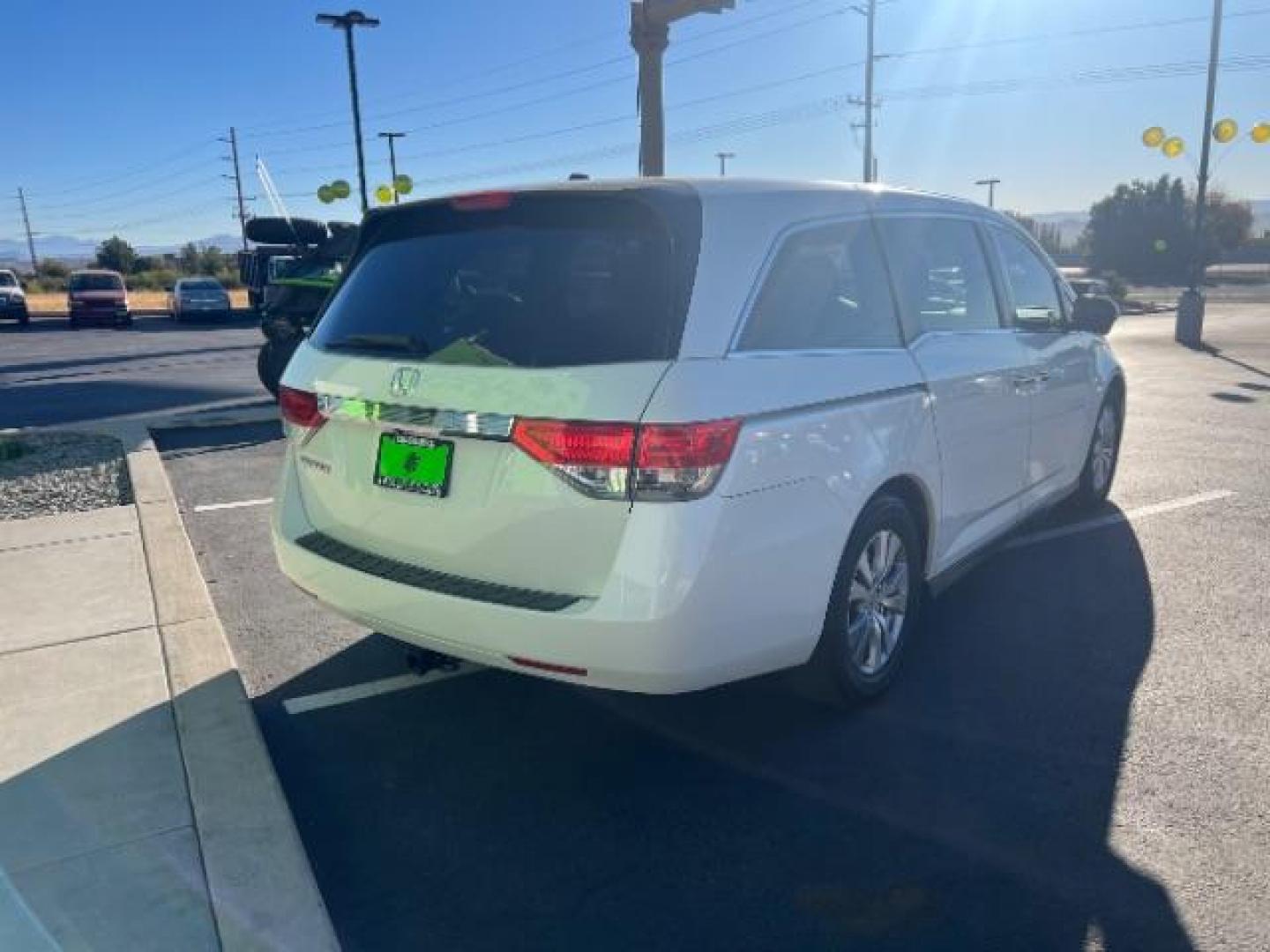 2014 White Diamond Pearl /Gray Honda Odyssey EX-L (5FNRL5H60EB) with an 3.5L V6 SOHC 24V engine, 6-Speed Automatic transmission, located at 1865 East Red Hills Pkwy, St. George, 84770, (435) 628-0023, 37.120850, -113.543640 - Photo#4