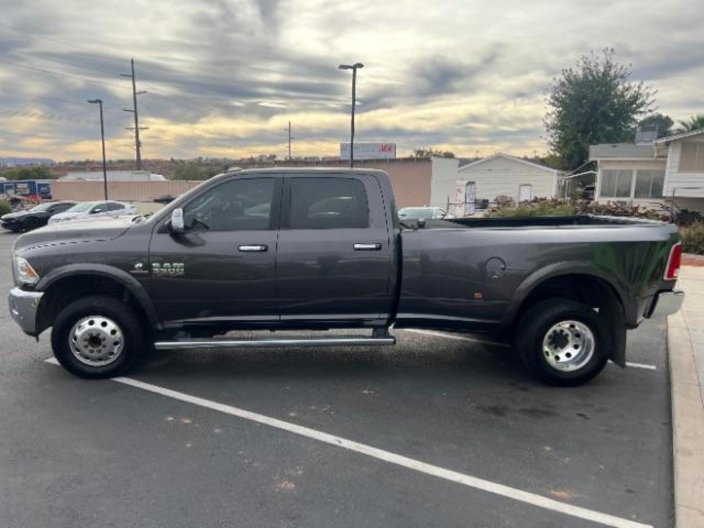 2017 Grey /Black/Diesel Gray, vinyl RAM 3500 Laramie Crew Cab LWB 4WD DRW (3C63RRJL2HG) with an 6.7L L6 OHV 24V TURBO DIESEL engine, 6-Speed Automatic transmission, located at 1865 East Red Hills Pkwy, St. George, 84770, (435) 628-0023, 37.120850, -113.543640 - 4x4, Low miles, 100 Gallon Aux Gas Tank, Very clean. We can help you get financing. Call or stop by! - Photo#3