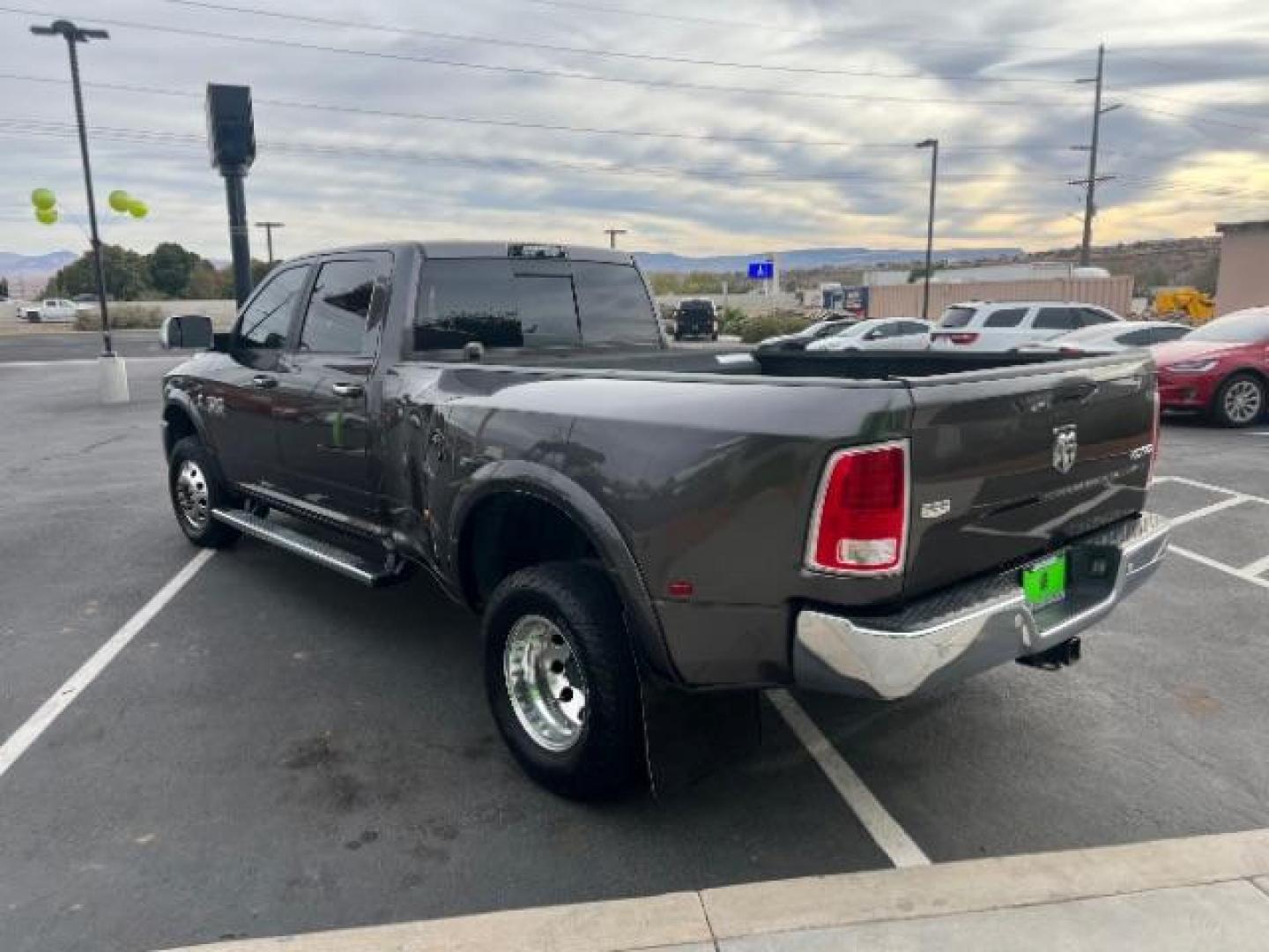 2017 Grey /Black/Diesel Gray, vinyl RAM 3500 Laramie Crew Cab LWB 4WD DRW (3C63RRJL2HG) with an 6.7L L6 OHV 24V TURBO DIESEL engine, 6-Speed Automatic transmission, located at 1865 East Red Hills Pkwy, St. George, 84770, (435) 628-0023, 37.120850, -113.543640 - 4x4, Low miles, 100 Gallon Aux Gas Tank, Very clean. We can help you get financing. Call or stop by! - Photo#4