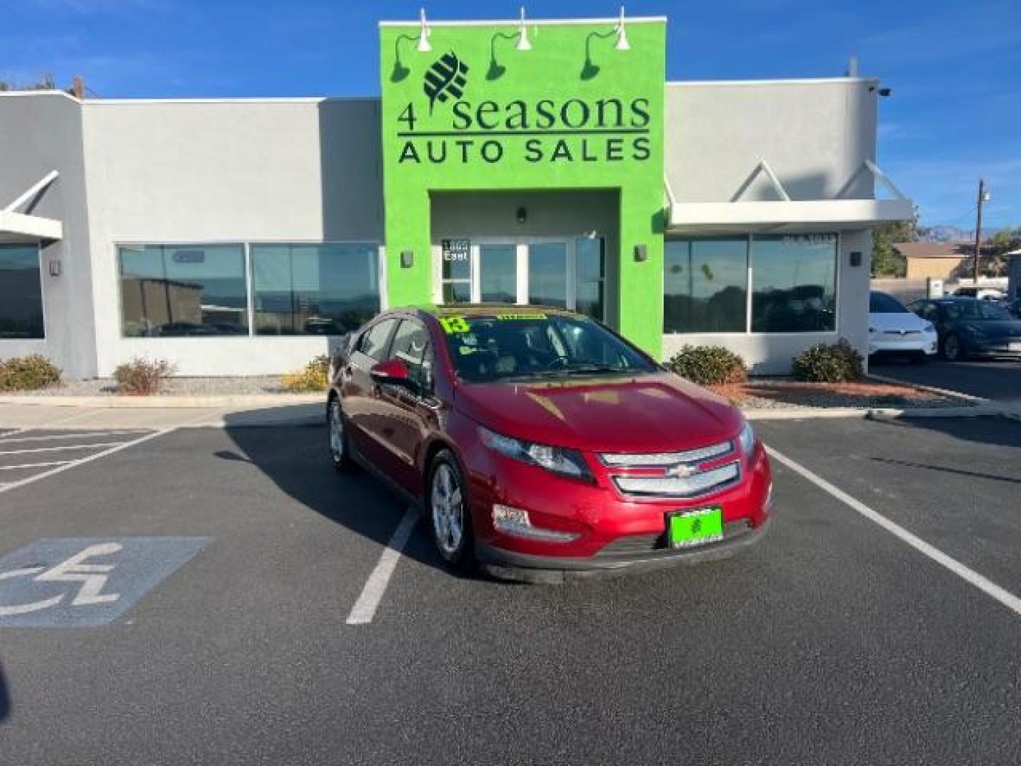 2013 Red /Black Leather Interior Chevrolet Volt Premium w/ LEP (1G1RF6E46DU) with an 1.4L L4 DOHC 16V PLUG-IN HYBRID engine, Continuously Variable Transmission transmission, located at 1865 East Red Hills Pkwy, St. George, 84770, (435) 628-0023, 37.120850, -113.543640 - ***This vehicle qualifies for the EV/Hybrid tax rebate of up to $4,000*** We are setup with the IRS to recieve direct payments within 72 hours. We file the rebate online with IRS and can credit it to your down payment, reduce the sales price OR give you cashback!! These cars will not last and can o - Photo#0