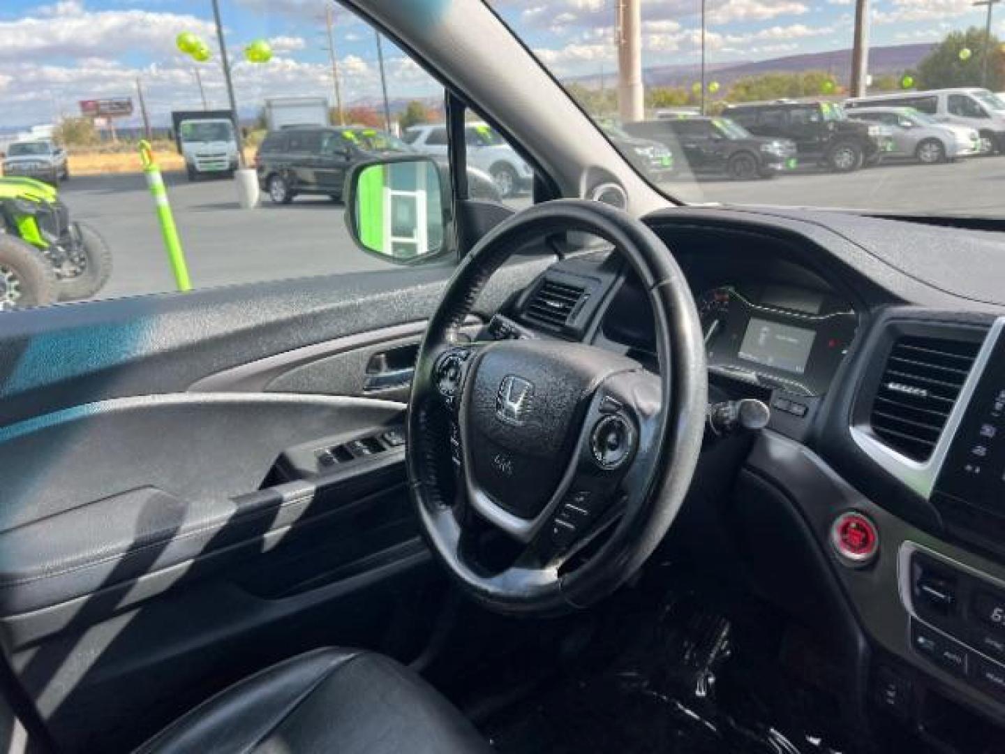 2016 Modern Steel Metallic /Black, leather Honda Pilot EXL 2WD (5FNYF5H57GB) with an 3.5L V6 SOHC 24V engine, 6-Speed Automatic transmission, located at 1865 East Red Hills Pkwy, St. George, 84770, (435) 628-0023, 37.120850, -113.543640 - We specialize in helping ALL people get the best financing available. No matter your credit score, good, bad or none we can get you an amazing rate. Had a bankruptcy, divorce, or repossessions? We give you the green light to get your credit back on the road. Low down and affordable payments that fit - Photo#34