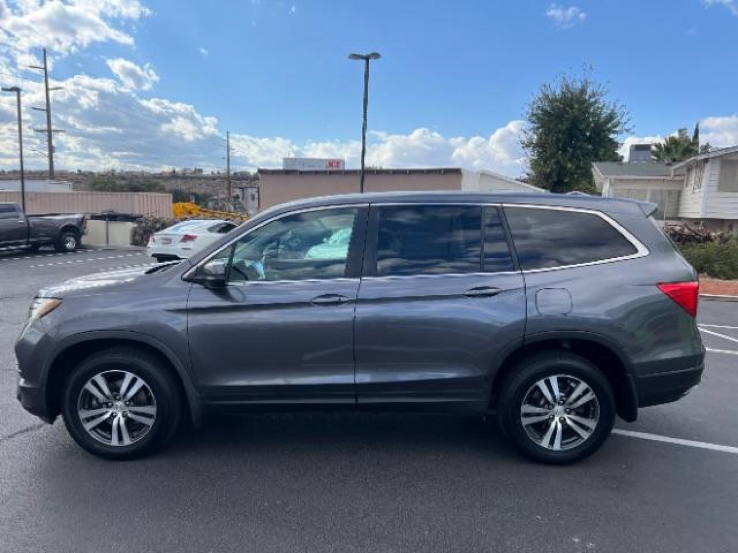 2016 Modern Steel Metallic /Black, leather Honda Pilot EXL 2WD (5FNYF5H57GB) with an 3.5L V6 SOHC 24V engine, 6-Speed Automatic transmission, located at 1865 East Red Hills Pkwy, St. George, 84770, (435) 628-0023, 37.120850, -113.543640 - We specialize in helping ALL people get the best financing available. No matter your credit score, good, bad or none we can get you an amazing rate. Had a bankruptcy, divorce, or repossessions? We give you the green light to get your credit back on the road. Low down and affordable payments that fit - Photo#3