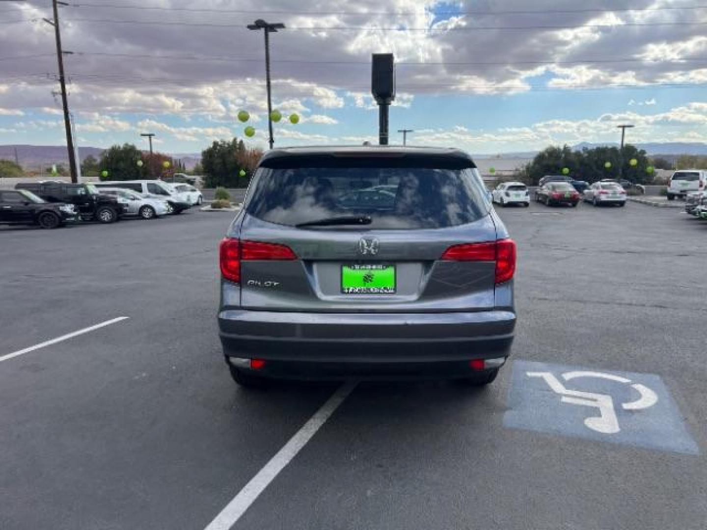 2016 Modern Steel Metallic /Black, leather Honda Pilot EXL 2WD (5FNYF5H57GB) with an 3.5L V6 SOHC 24V engine, 6-Speed Automatic transmission, located at 1865 East Red Hills Pkwy, St. George, 84770, (435) 628-0023, 37.120850, -113.543640 - We specialize in helping ALL people get the best financing available. No matter your credit score, good, bad or none we can get you an amazing rate. Had a bankruptcy, divorce, or repossessions? We give you the green light to get your credit back on the road. Low down and affordable payments that fit - Photo#5