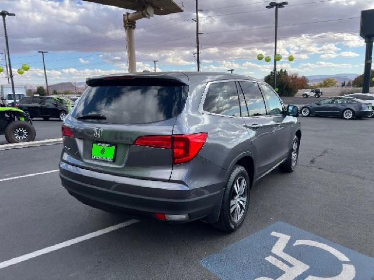 2016 Modern Steel Metallic /Black, leather Honda Pilot EXL 2WD (5FNYF5H57GB) with an 3.5L V6 SOHC 24V engine, 6-Speed Automatic transmission, located at 1865 East Red Hills Pkwy, St. George, 84770, (435) 628-0023, 37.120850, -113.543640 - We specialize in helping ALL people get the best financing available. No matter your credit score, good, bad or none we can get you an amazing rate. Had a bankruptcy, divorce, or repossessions? We give you the green light to get your credit back on the road. Low down and affordable payments that fit - Photo#6