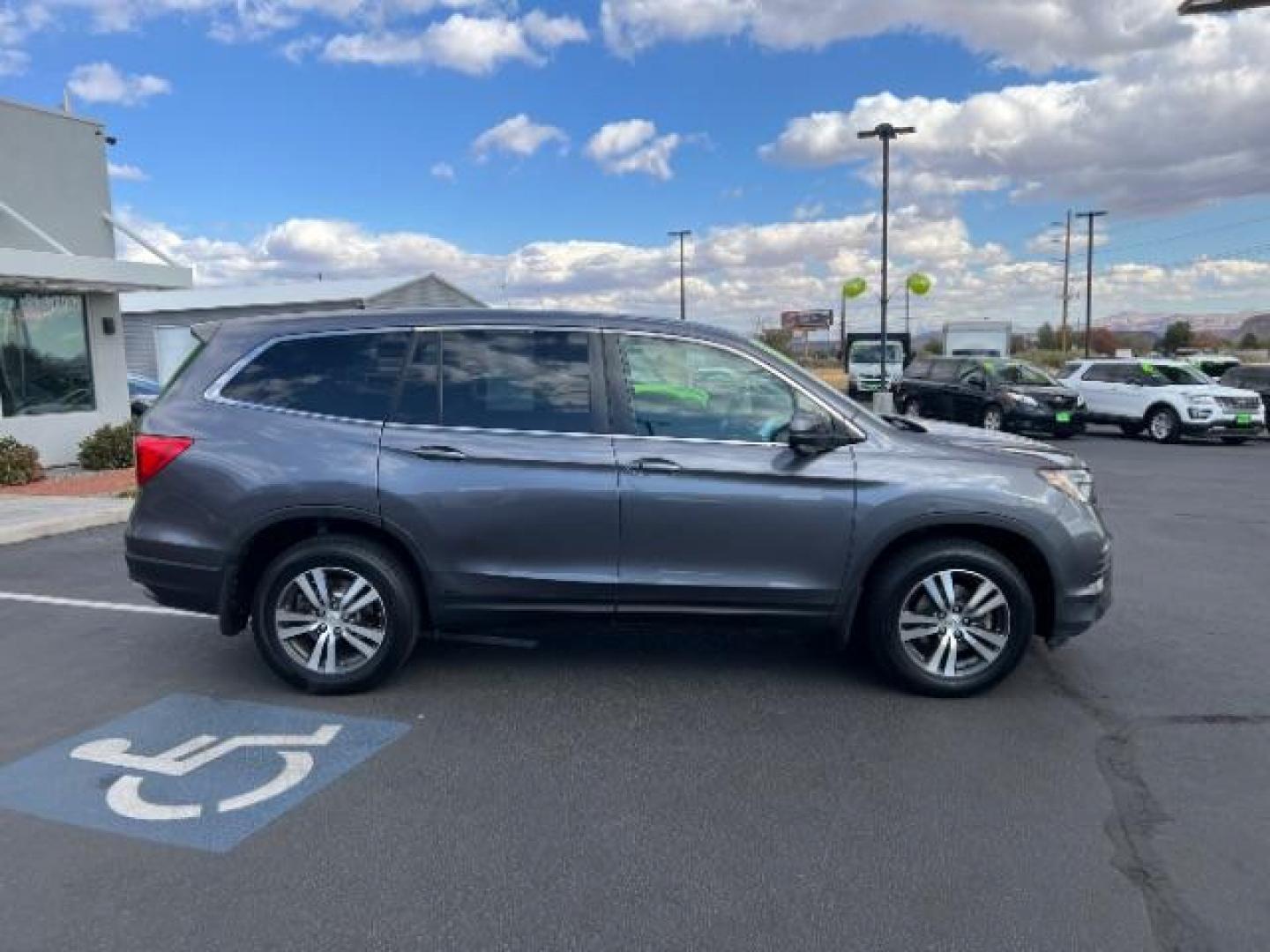 2016 Modern Steel Metallic /Black, leather Honda Pilot EXL 2WD (5FNYF5H57GB) with an 3.5L V6 SOHC 24V engine, 6-Speed Automatic transmission, located at 1865 East Red Hills Pkwy, St. George, 84770, (435) 628-0023, 37.120850, -113.543640 - We specialize in helping ALL people get the best financing available. No matter your credit score, good, bad or none we can get you an amazing rate. Had a bankruptcy, divorce, or repossessions? We give you the green light to get your credit back on the road. Low down and affordable payments that fit - Photo#7