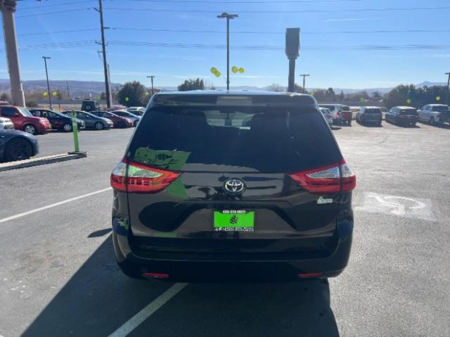 2016 Midnight Black Metal /Ash, cloth Toyota Sienna L FWD 7-Passenger V6 (5TDZK3DC7GS) with an 3.5L V6 EFI DOHC 24V engine, 5-Speed Automatic transmission, located at 940 North Main Street, Cedar City, UT, 84720, (435) 628-0023, 37.692936, -113.061897 - Photo#5