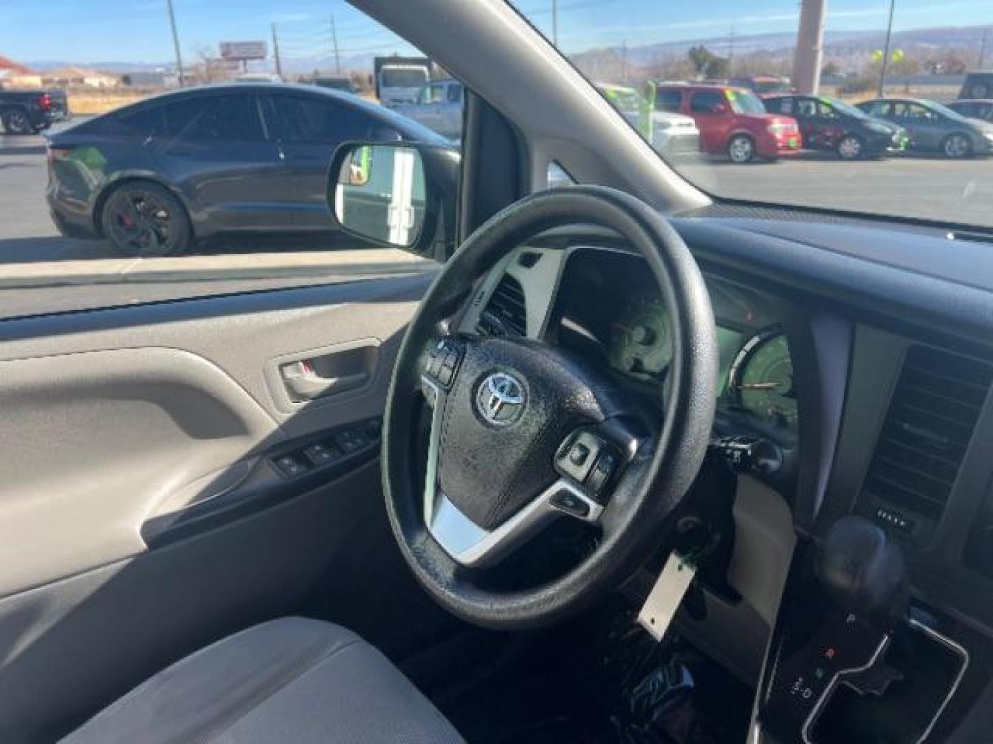 2016 Midnight Black Metal /Ash, cloth Toyota Sienna L FWD 7-Passenger V6 (5TDZK3DC7GS) with an 3.5L V6 EFI DOHC 24V engine, 5-Speed Automatic transmission, located at 940 North Main Street, Cedar City, UT, 84720, (435) 628-0023, 37.692936, -113.061897 - Photo#29