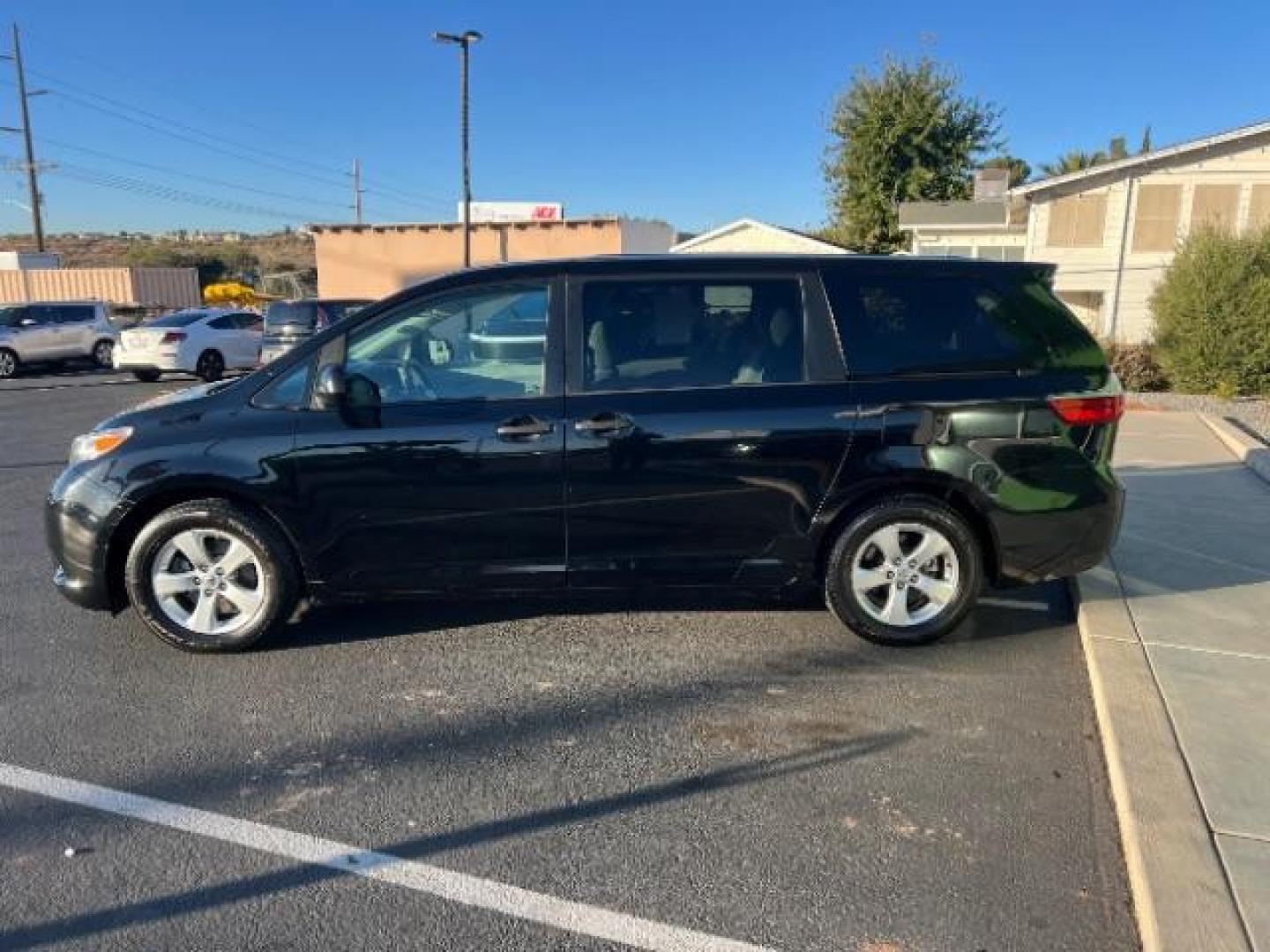 2016 Midnight Black Metallic /Ash, cloth Toyota Sienna L FWD 7-Passenger V6 (5TDZK3DC7GS) with an 3.5L V6 EFI DOHC 24V engine, 5-Speed Automatic transmission, located at 1865 East Red Hills Pkwy, St. George, 84770, (435) 628-0023, 37.120850, -113.543640 - We specialize in helping ALL people get the best financing available. No matter your credit score, good, bad or none we can get you an amazing rate. Had a bankruptcy, divorce, or repossessions? We give you the green light to get your credit back on the road. Low down and affordable payments that fit - Photo#3