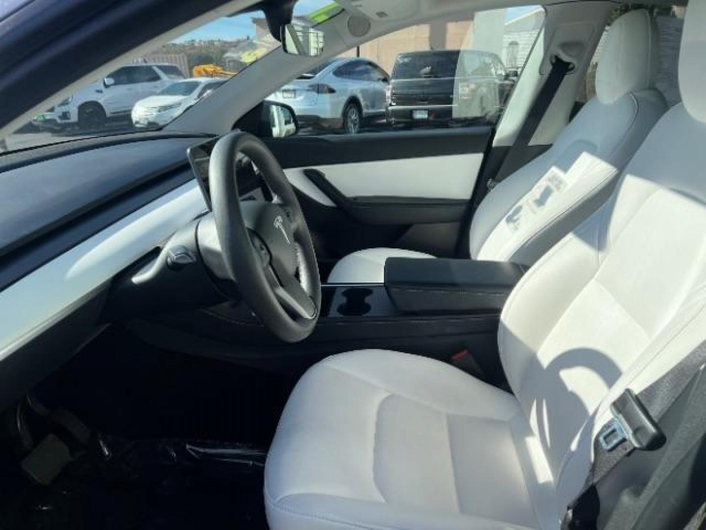 2021 Midnight Silver Metallic /Black and White Tesla Model Y Standard (5YJYGDED0MF) with an ELECTRIC engine, 1-Speed Automatic transmission, located at 1865 East Red Hills Pkwy, St. George, 84770, (435) 628-0023, 37.120850, -113.543640 - Great condition, Stadard Range of 250+ on a charge. Warranty on battery and Motor up to 8years and 100k miles We are your local Tesla experts. Education, Repairs, Special Orders 4 Seasons Auto 435-628-0023 DL #7932 - Photo#13