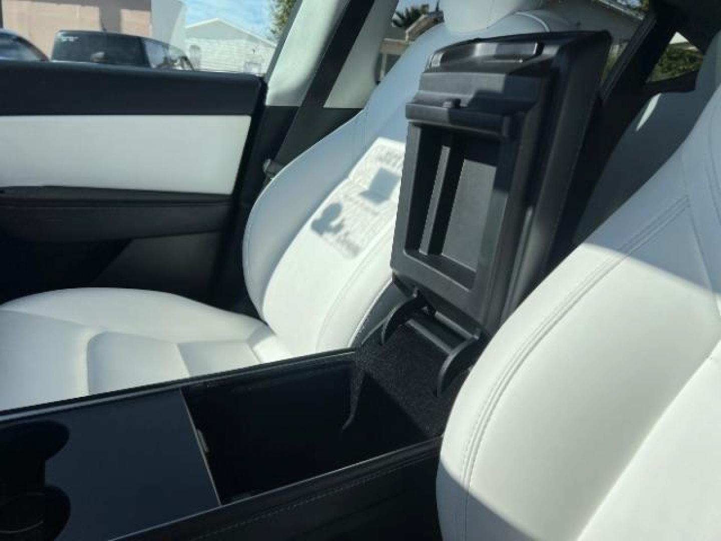 2021 Midnight Silver Metallic /Black and White Tesla Model Y Standard (5YJYGDED0MF) with an ELECTRIC engine, 1-Speed Automatic transmission, located at 1865 East Red Hills Pkwy, St. George, 84770, (435) 628-0023, 37.120850, -113.543640 - Great condition, Stadard Range of 250+ on a charge. Warranty on battery and Motor up to 8years and 100k miles We are your local Tesla experts. Education, Repairs, Special Orders 4 Seasons Auto 435-628-0023 DL #7932 - Photo#16