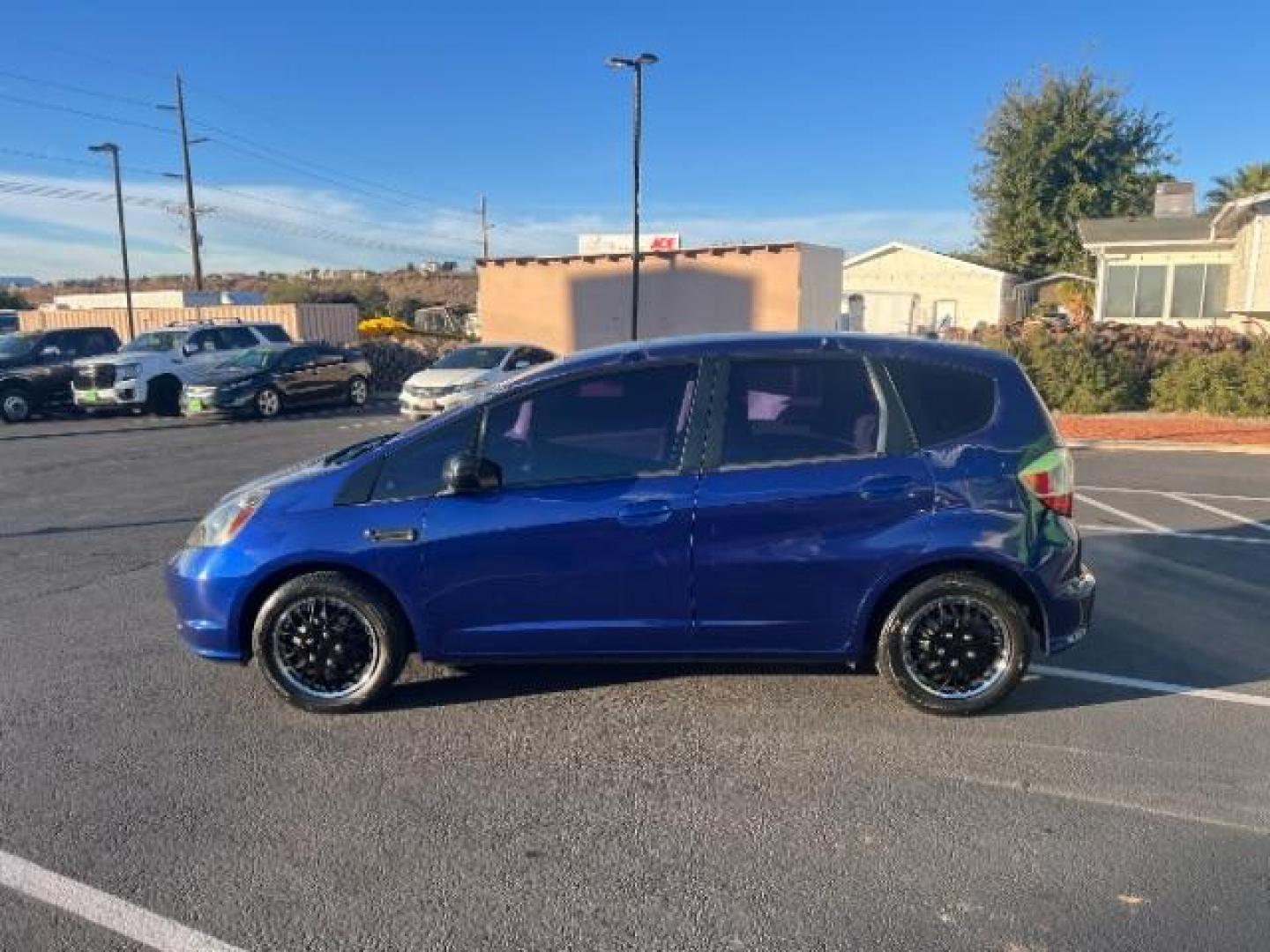 2010 Blue Sensation Pearl /Gray Cloth Interior Honda Fit 5-Speed AT (JHMGE8H28AS) with an 1.5L L4 SOHC 16V engine, 5-Speed Automatic transmission, located at 940 North Main Street, Cedar City, UT, 84720, (435) 628-0023, 37.692936, -113.061897 - We specialize in helping ALL people get the best financing available. No matter your credit score, good, bad or none we can get you an amazing rate. Had a bankruptcy, divorce, or repossessions? We give you the green light to get your credit back on the road. Low down and affordable payments that fit - Photo#3