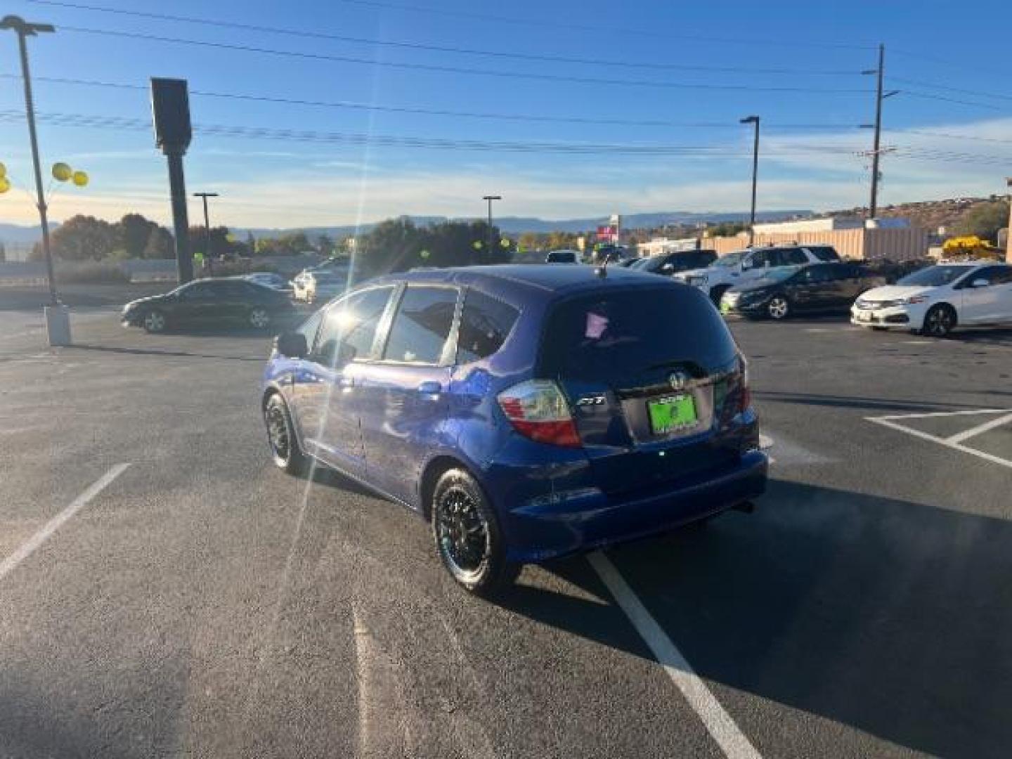 2010 Blue Sensation Pearl /Gray Cloth Interior Honda Fit 5-Speed AT (JHMGE8H28AS) with an 1.5L L4 SOHC 16V engine, 5-Speed Automatic transmission, located at 940 North Main Street, Cedar City, UT, 84720, (435) 628-0023, 37.692936, -113.061897 - We specialize in helping ALL people get the best financing available. No matter your credit score, good, bad or none we can get you an amazing rate. Had a bankruptcy, divorce, or repossessions? We give you the green light to get your credit back on the road. Low down and affordable payments that fit - Photo#4