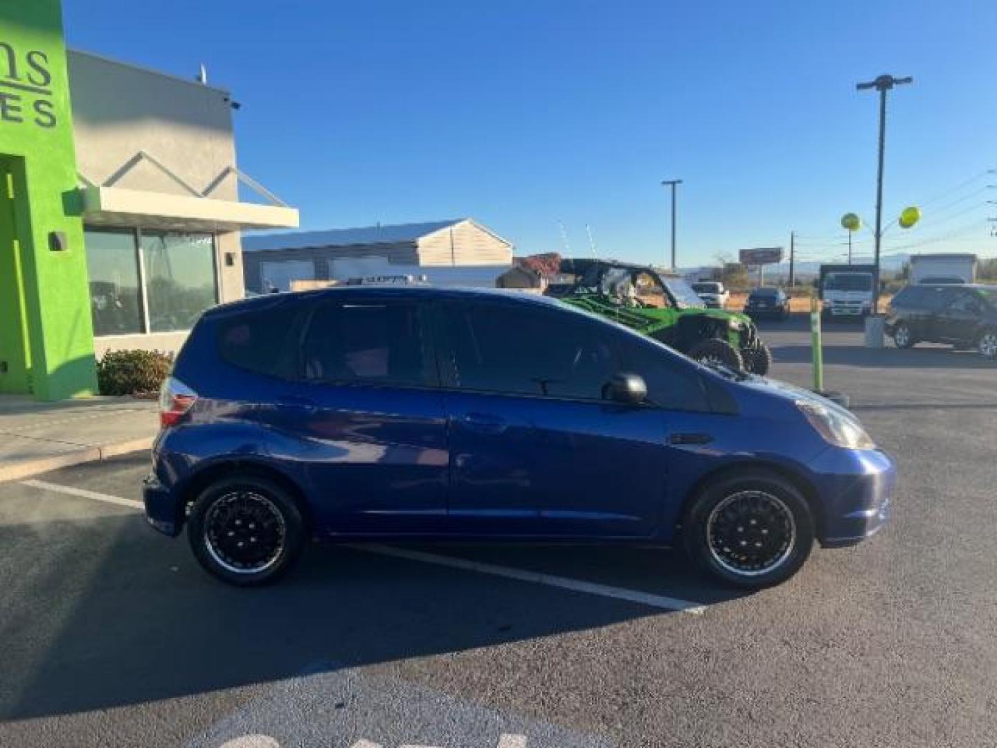 2010 Blue Sensation Pearl /Gray Cloth Interior Honda Fit 5-Speed AT (JHMGE8H28AS) with an 1.5L L4 SOHC 16V engine, 5-Speed Automatic transmission, located at 940 North Main Street, Cedar City, UT, 84720, (435) 628-0023, 37.692936, -113.061897 - We specialize in helping ALL people get the best financing available. No matter your credit score, good, bad or none we can get you an amazing rate. Had a bankruptcy, divorce, or repossessions? We give you the green light to get your credit back on the road. Low down and affordable payments that fit - Photo#7