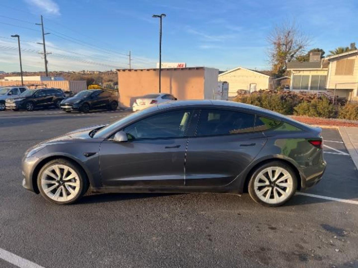 2022 Midnight Silver Metallic /All Black Tesla Model 3 Standard Range Plus (5YJ3E1EA9NF) with an ELECTRIC engine, 1-Speed Automatic transmission, located at 1865 East Red Hills Pkwy, St. George, 84770, (435) 628-0023, 37.120850, -113.543640 - Get additional $4k off the list price. *****QUALIFIES FOR EV TAX REBATE******** We are setup with IRS to file your tax rebate and get you a refund with in 72 hours. Take as cash or use as down payment. Check out the IRS website to be sure you qualify. Great condition, This has the LFP (iron) batte - Photo#3