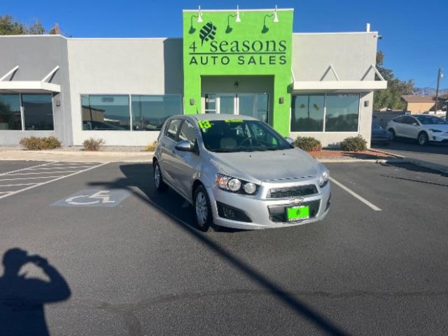 2013 Silver Ice Metallic /Dark Pewter/Dark Titanium Cloth Interior Chevrolet Sonic LT Auto 5-Door (1G1JC6SG9D4) with an 1.8L L4 DOHC 24V engine, 6-Speed Automatic transmission, located at 940 North Main Street, Cedar City, UT, 84720, (435) 628-0023, 37.692936, -113.061897 - We specialize in helping ALL people get the best financing available. No matter your credit score, good, bad or none we can get you an amazing rate. Had a bankruptcy, divorce, or repossessions? We give you the green light to get your credit back on the road. Low down and affordable payments that fit - Photo#0