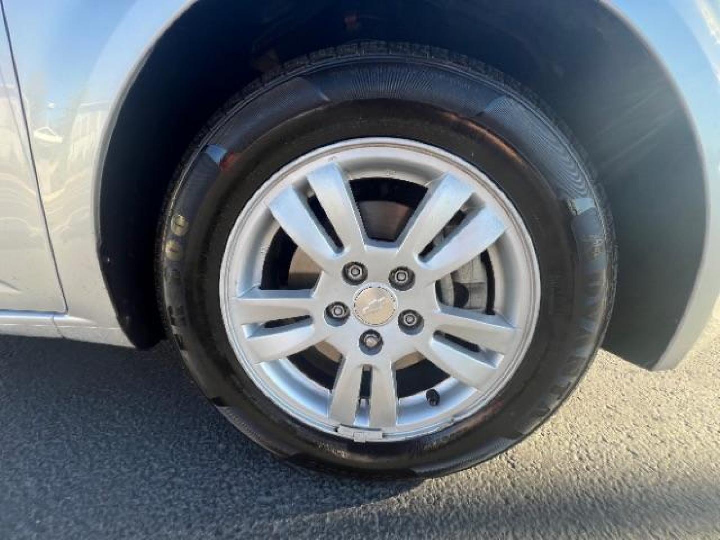 2013 Silver Ice Metallic /Dark Pewter/Dark Titanium Cloth Interior Chevrolet Sonic LT Auto 5-Door (1G1JC6SG9D4) with an 1.8L L4 DOHC 24V engine, 6-Speed Automatic transmission, located at 940 North Main Street, Cedar City, UT, 84720, (435) 628-0023, 37.692936, -113.061897 - We specialize in helping ALL people get the best financing available. No matter your credit score, good, bad or none we can get you an amazing rate. Had a bankruptcy, divorce, or repossessions? We give you the green light to get your credit back on the road. Low down and affordable payments that fit - Photo#10