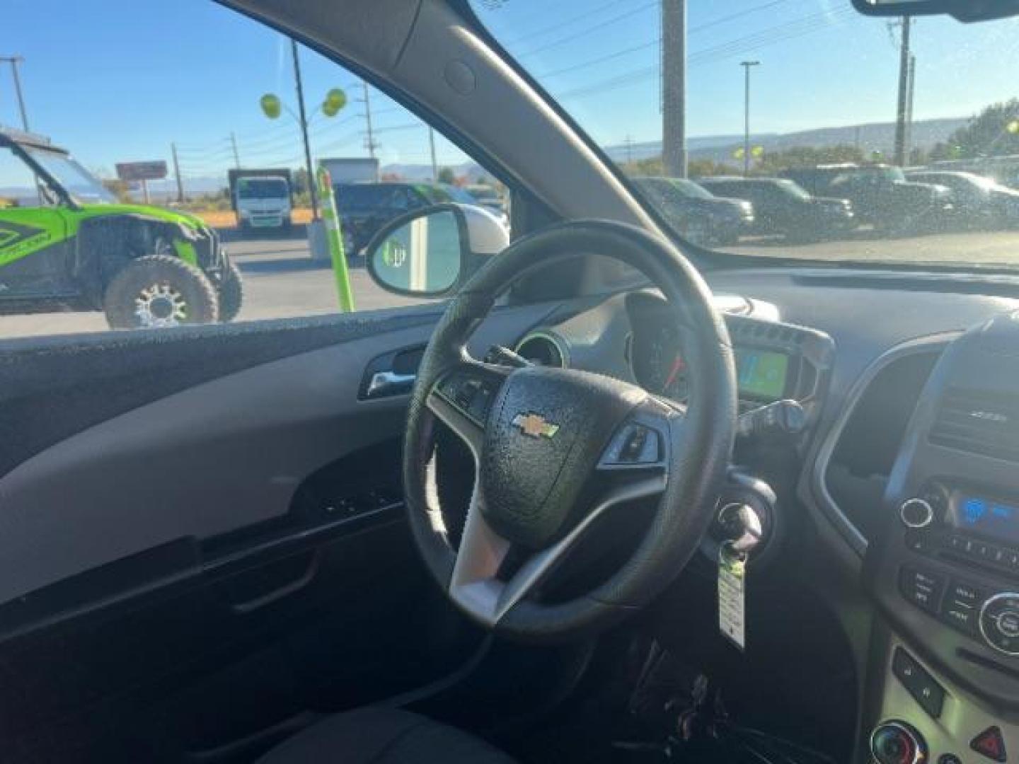 2013 Silver Ice Metallic /Dark Pewter/Dark Titanium Cloth Interior Chevrolet Sonic LT Auto 5-Door (1G1JC6SG9D4) with an 1.8L L4 DOHC 24V engine, 6-Speed Automatic transmission, located at 940 North Main Street, Cedar City, UT, 84720, (435) 628-0023, 37.692936, -113.061897 - We specialize in helping ALL people get the best financing available. No matter your credit score, good, bad or none we can get you an amazing rate. Had a bankruptcy, divorce, or repossessions? We give you the green light to get your credit back on the road. Low down and affordable payments that fit - Photo#30