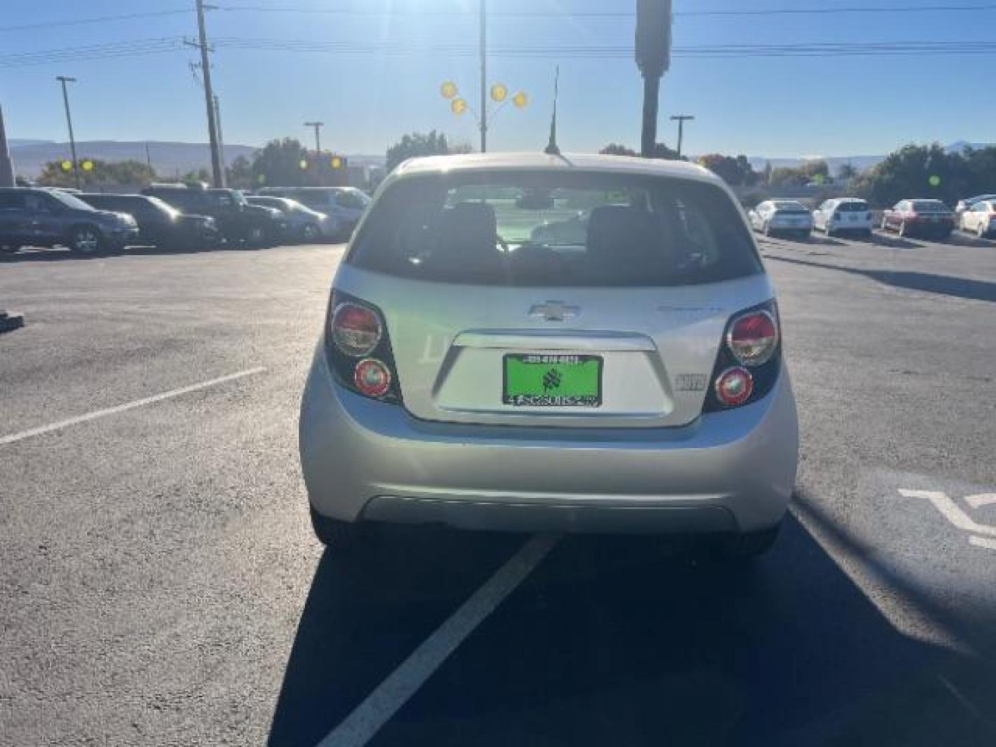 2013 Silver Ice Metallic /Dark Pewter/Dark Titanium Cloth Interior Chevrolet Sonic LT Auto 5-Door (1G1JC6SG9D4) with an 1.8L L4 DOHC 24V engine, 6-Speed Automatic transmission, located at 940 North Main Street, Cedar City, UT, 84720, (435) 628-0023, 37.692936, -113.061897 - We specialize in helping ALL people get the best financing available. No matter your credit score, good, bad or none we can get you an amazing rate. Had a bankruptcy, divorce, or repossessions? We give you the green light to get your credit back on the road. Low down and affordable payments that fit - Photo#5