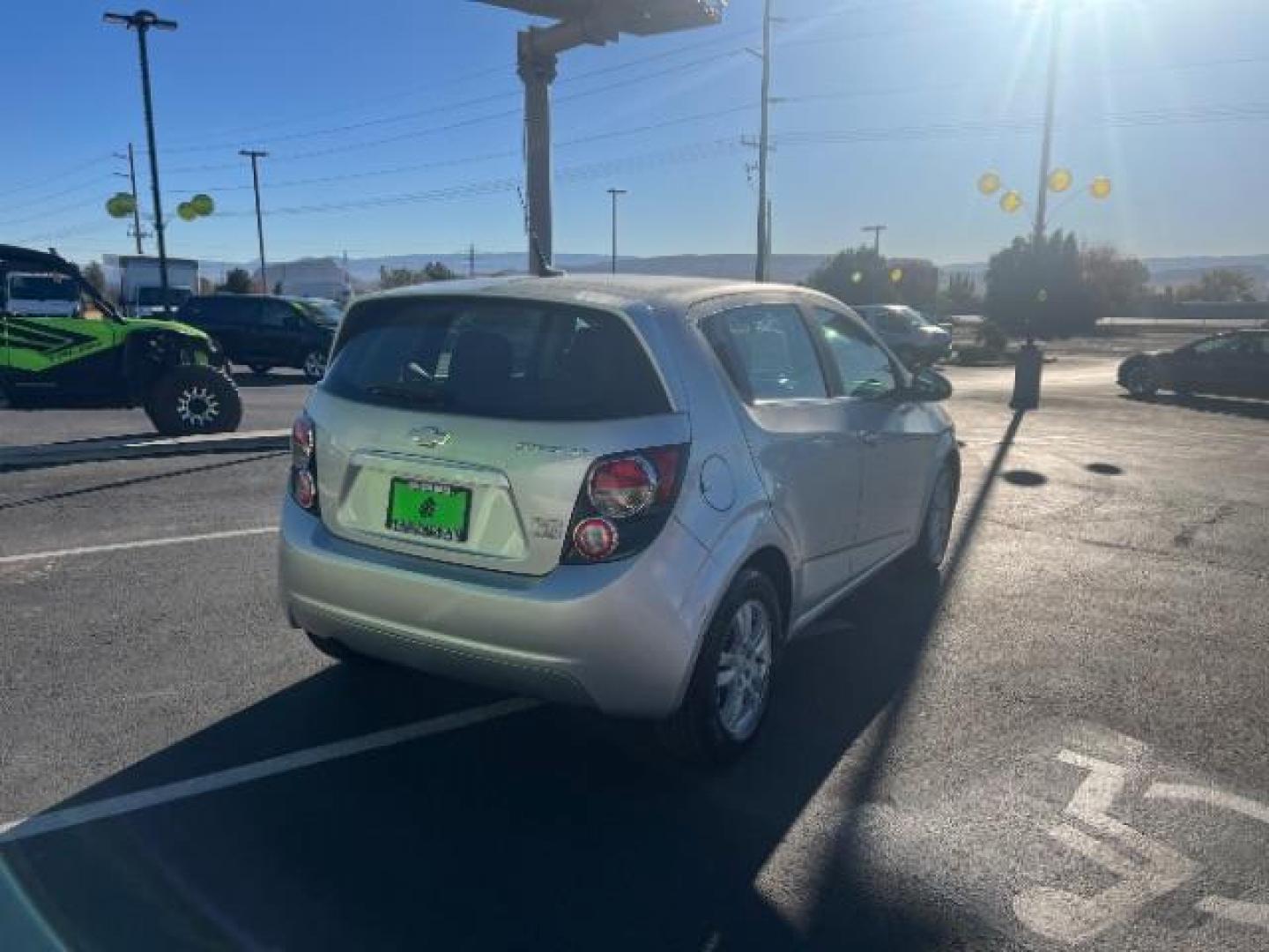 2013 Silver Ice Metallic /Dark Pewter/Dark Titanium Cloth Interior Chevrolet Sonic LT Auto 5-Door (1G1JC6SG9D4) with an 1.8L L4 DOHC 24V engine, 6-Speed Automatic transmission, located at 940 North Main Street, Cedar City, UT, 84720, (435) 628-0023, 37.692936, -113.061897 - We specialize in helping ALL people get the best financing available. No matter your credit score, good, bad or none we can get you an amazing rate. Had a bankruptcy, divorce, or repossessions? We give you the green light to get your credit back on the road. Low down and affordable payments that fit - Photo#6