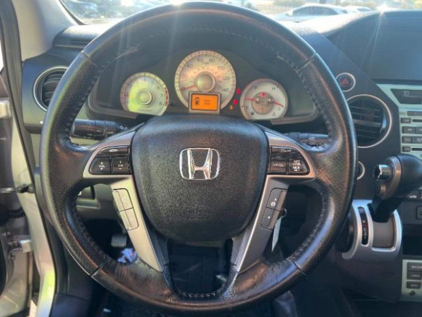 2011 Alabaster Silver Metallic /Black Leather Interior Honda Pilot Touring 4WD 5-Spd AT with DVD (5FNYF4H98BB) with an 3.5L V6 SOHC 24V engine, 5-Speed Automatic transmission, located at 940 North Main Street, Cedar City, UT, 84720, (435) 628-0023, 37.692936, -113.061897 - We specialize in helping ALL people get the best financing available. No matter your credit score, good, bad or none we can get you an amazing rate. Had a bankruptcy, divorce, or repossessions? We give you the green light to get your credit back on the road. Low down and affordable payments that fit - Photo#14