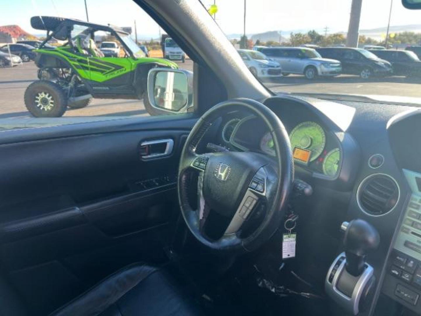 2011 Alabaster Silver Metallic /Black Leather Interior Honda Pilot Touring 4WD 5-Spd AT with DVD (5FNYF4H98BB) with an 3.5L V6 SOHC 24V engine, 5-Speed Automatic transmission, located at 940 North Main Street, Cedar City, UT, 84720, (435) 628-0023, 37.692936, -113.061897 - We specialize in helping ALL people get the best financing available. No matter your credit score, good, bad or none we can get you an amazing rate. Had a bankruptcy, divorce, or repossessions? We give you the green light to get your credit back on the road. Low down and affordable payments that fit - Photo#37