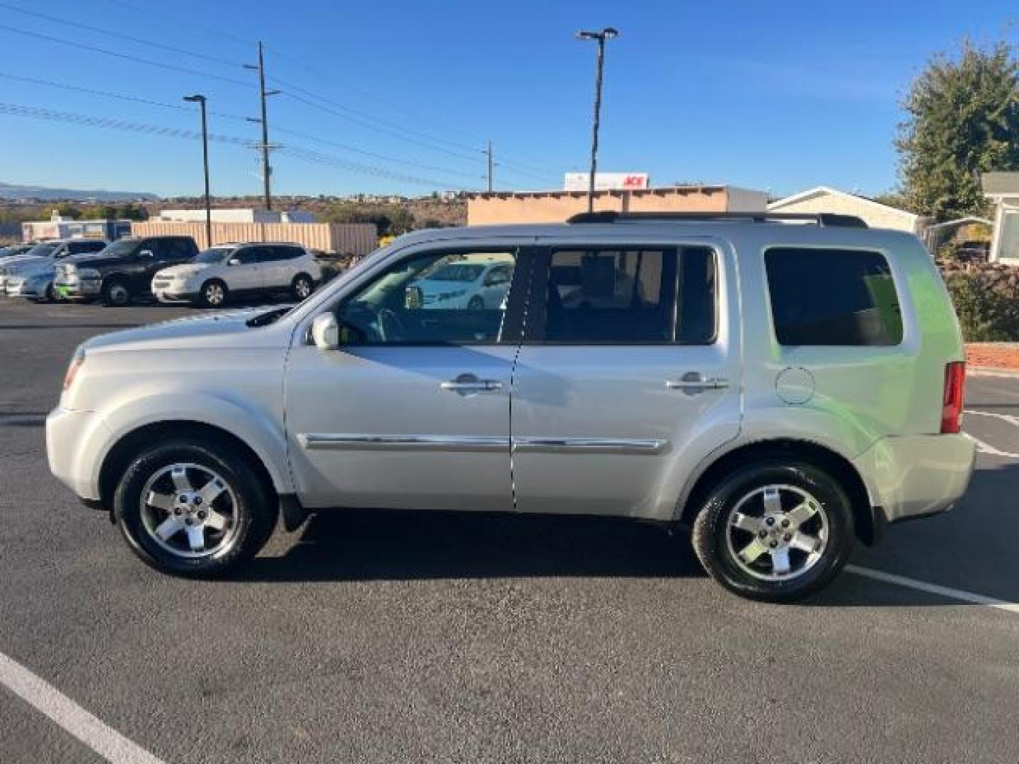 2011 Alabaster Silver Metallic /Black Leather Interior Honda Pilot Touring 4WD 5-Spd AT with DVD (5FNYF4H98BB) with an 3.5L V6 SOHC 24V engine, 5-Speed Automatic transmission, located at 940 North Main Street, Cedar City, UT, 84720, (435) 628-0023, 37.692936, -113.061897 - We specialize in helping ALL people get the best financing available. No matter your credit score, good, bad or none we can get you an amazing rate. Had a bankruptcy, divorce, or repossessions? We give you the green light to get your credit back on the road. Low down and affordable payments that fit - Photo#3