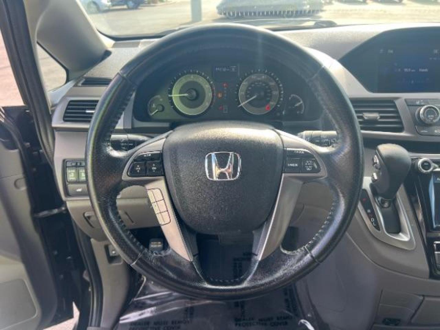 2014 Crystal Black Pearl /Gray Honda Odyssey EX-L (5FNRL5H6XEB) with an 3.5L V6 SOHC 24V engine, 6-Speed Automatic transmission, located at 940 North Main Street, Cedar City, UT, 84720, (435) 628-0023, 37.692936, -113.061897 - We specialize in helping ALL people get the best financing available. No matter your credit score, good, bad or none we can get you an amazing rate. Had a bankruptcy, divorce, or repossessions? We give you the green light to get your credit back on the road. Low down and affordable payments that fit - Photo#18