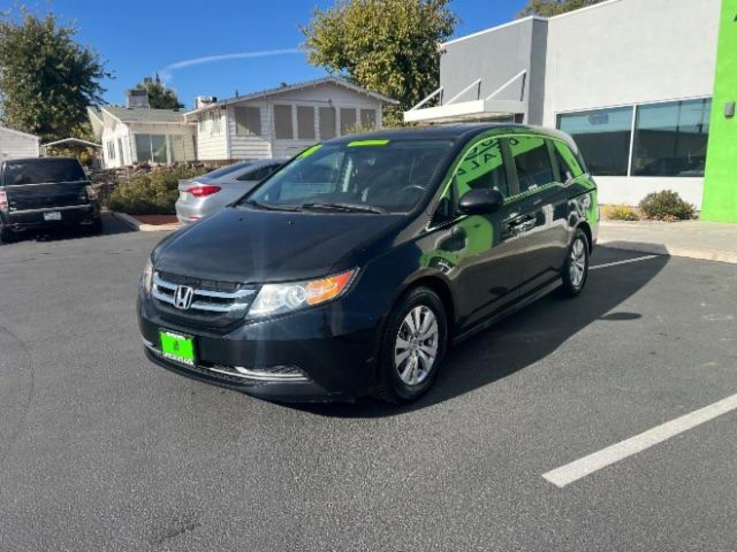 2014 Crystal Black Pearl /Gray Honda Odyssey EX-L (5FNRL5H6XEB) with an 3.5L V6 SOHC 24V engine, 6-Speed Automatic transmission, located at 940 North Main Street, Cedar City, UT, 84720, (435) 628-0023, 37.692936, -113.061897 - We specialize in helping ALL people get the best financing available. No matter your credit score, good, bad or none we can get you an amazing rate. Had a bankruptcy, divorce, or repossessions? We give you the green light to get your credit back on the road. Low down and affordable payments that fit - Photo#2