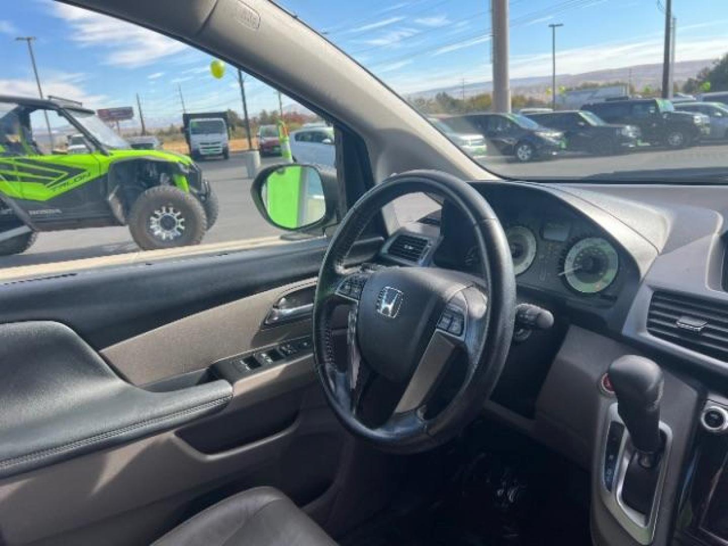 2014 Crystal Black Pearl /Gray Honda Odyssey EX-L (5FNRL5H6XEB) with an 3.5L V6 SOHC 24V engine, 6-Speed Automatic transmission, located at 940 North Main Street, Cedar City, UT, 84720, (435) 628-0023, 37.692936, -113.061897 - We specialize in helping ALL people get the best financing available. No matter your credit score, good, bad or none we can get you an amazing rate. Had a bankruptcy, divorce, or repossessions? We give you the green light to get your credit back on the road. Low down and affordable payments that fit - Photo#29