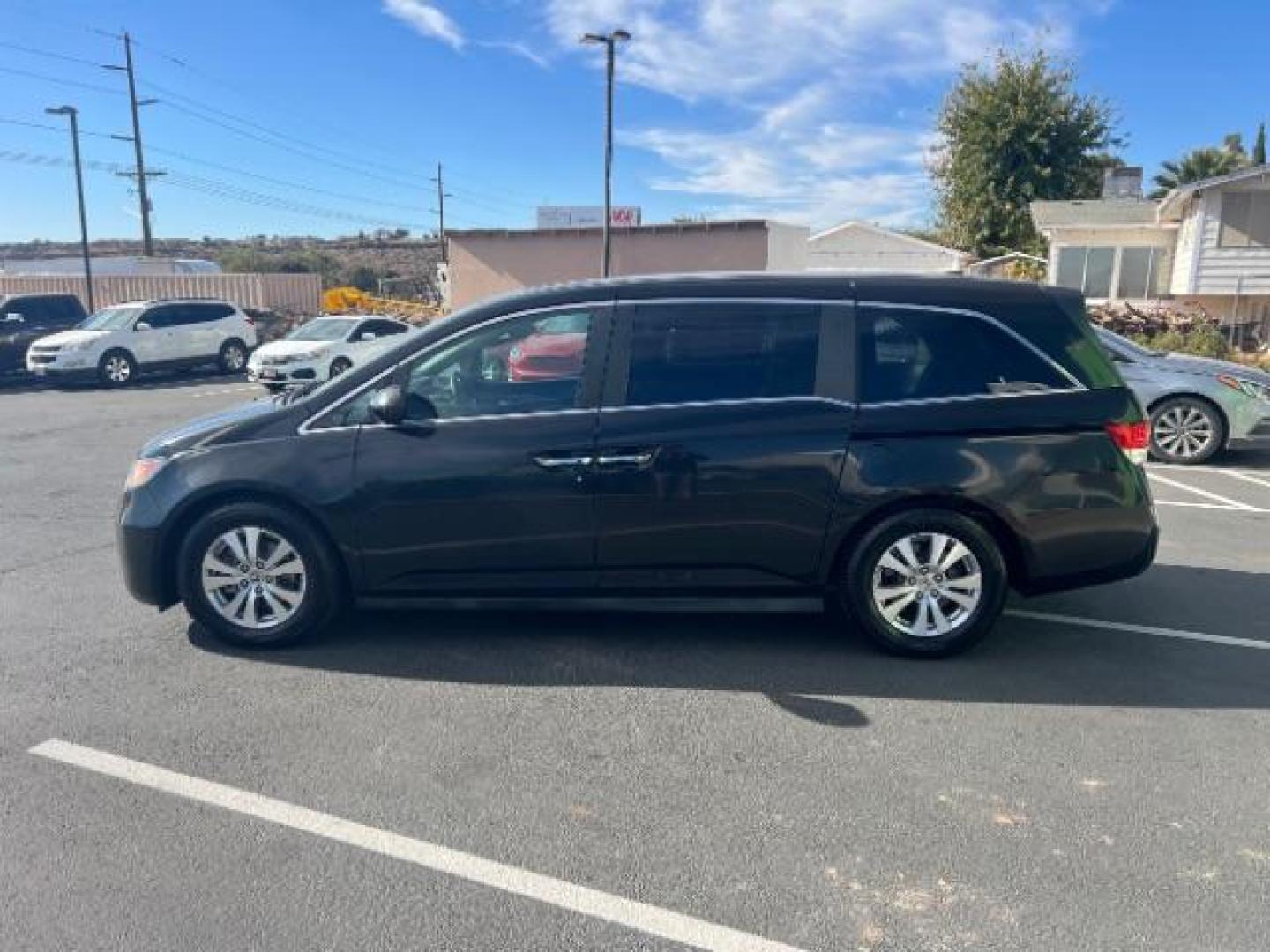 2014 Crystal Black Pearl /Gray Honda Odyssey EX-L (5FNRL5H6XEB) with an 3.5L V6 SOHC 24V engine, 6-Speed Automatic transmission, located at 940 North Main Street, Cedar City, UT, 84720, (435) 628-0023, 37.692936, -113.061897 - We specialize in helping ALL people get the best financing available. No matter your credit score, good, bad or none we can get you an amazing rate. Had a bankruptcy, divorce, or repossessions? We give you the green light to get your credit back on the road. Low down and affordable payments that fit - Photo#3