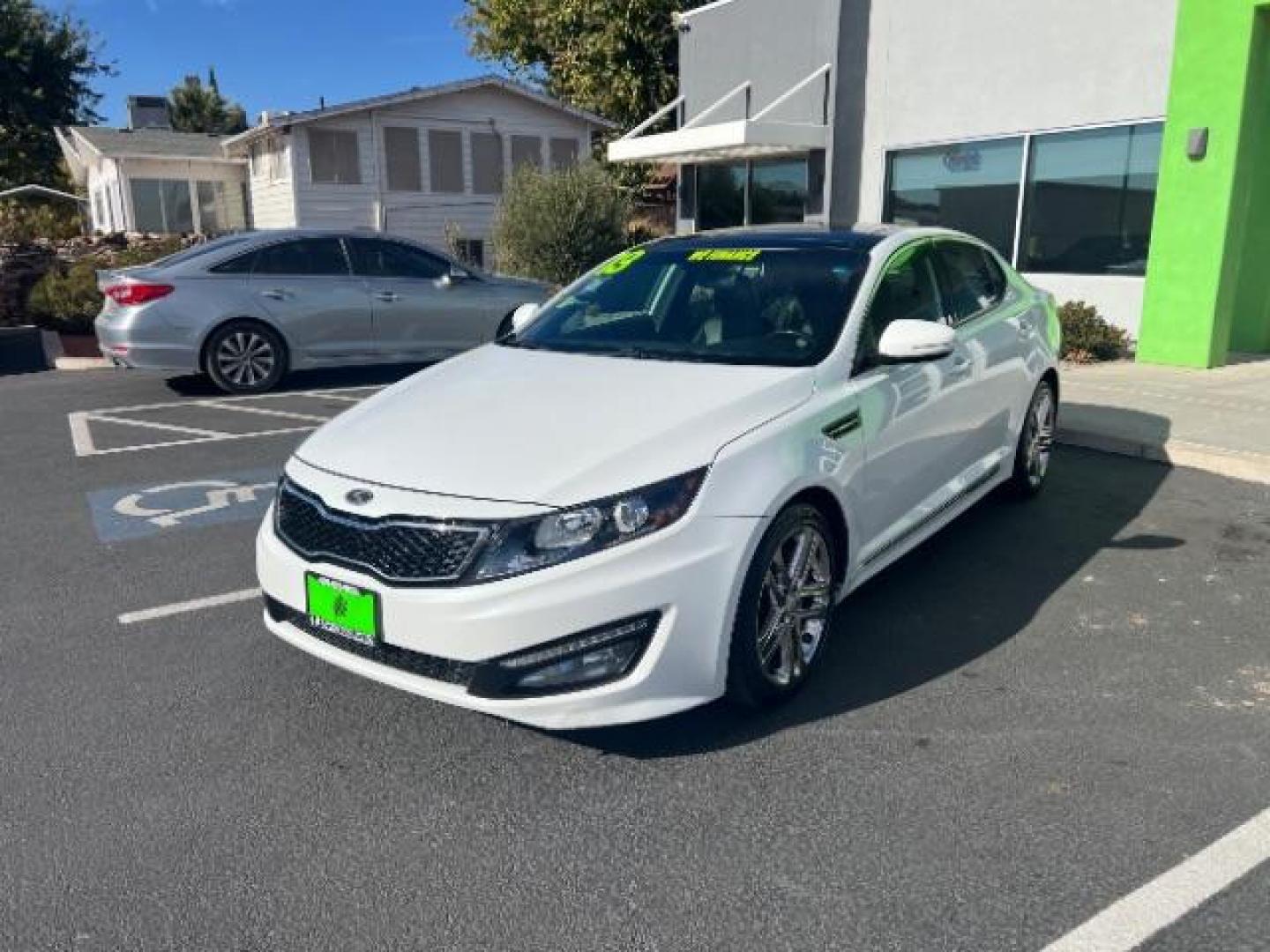 2013 Snow White Pearl /Black Leather Interior Kia Optima SX (5XXGR4A63DG) with an 2.0L L4 DOHC 16V TURBO engine, 6-Speed Automatic transmission, located at 1865 East Red Hills Pkwy, St. George, 84770, (435) 628-0023, 37.120850, -113.543640 - We specialize in helping ALL people get the best financing available. No matter your credit score, good, bad or none we can get you an amazing rate. Had a bankruptcy, divorce, or repossessions? We give you the green light to get your credit back on the road. Low down and affordable payments that fit - Photo#2