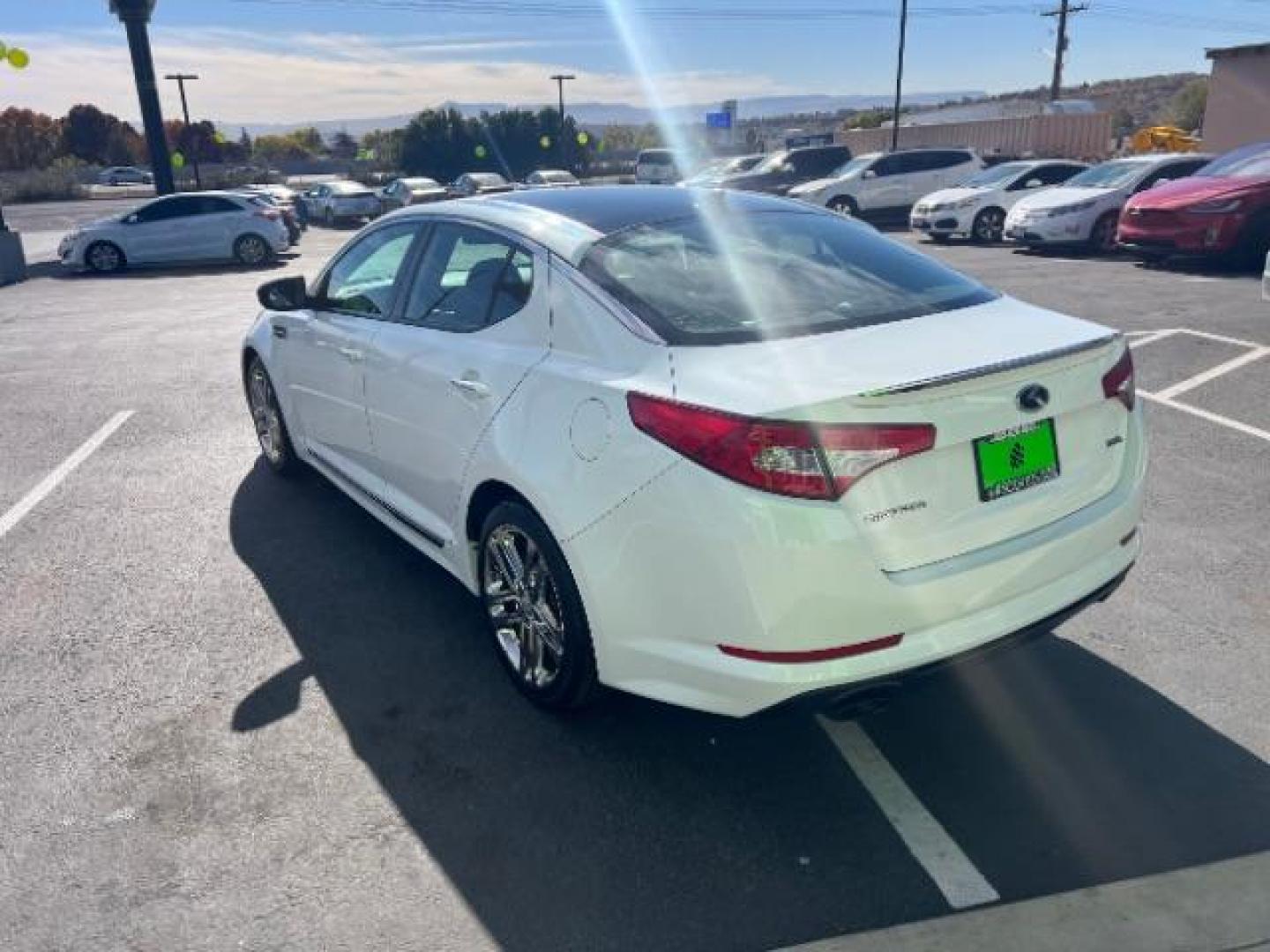 2013 Snow White Pearl /Black Leather Interior Kia Optima SX (5XXGR4A63DG) with an 2.0L L4 DOHC 16V TURBO engine, 6-Speed Automatic transmission, located at 1865 East Red Hills Pkwy, St. George, 84770, (435) 628-0023, 37.120850, -113.543640 - We specialize in helping ALL people get the best financing available. No matter your credit score, good, bad or none we can get you an amazing rate. Had a bankruptcy, divorce, or repossessions? We give you the green light to get your credit back on the road. Low down and affordable payments that fit - Photo#4