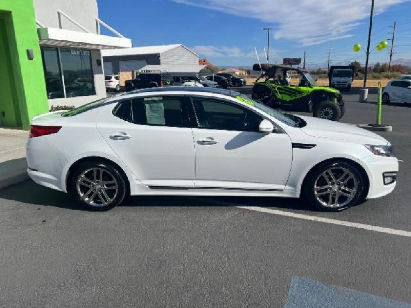 2013 Snow White Pearl /Black Leather Interior Kia Optima SX (5XXGR4A63DG) with an 2.0L L4 DOHC 16V TURBO engine, 6-Speed Automatic transmission, located at 1865 East Red Hills Pkwy, St. George, 84770, (435) 628-0023, 37.120850, -113.543640 - We specialize in helping ALL people get the best financing available. No matter your credit score, good, bad or none we can get you an amazing rate. Had a bankruptcy, divorce, or repossessions? We give you the green light to get your credit back on the road. Low down and affordable payments that fit - Photo#7