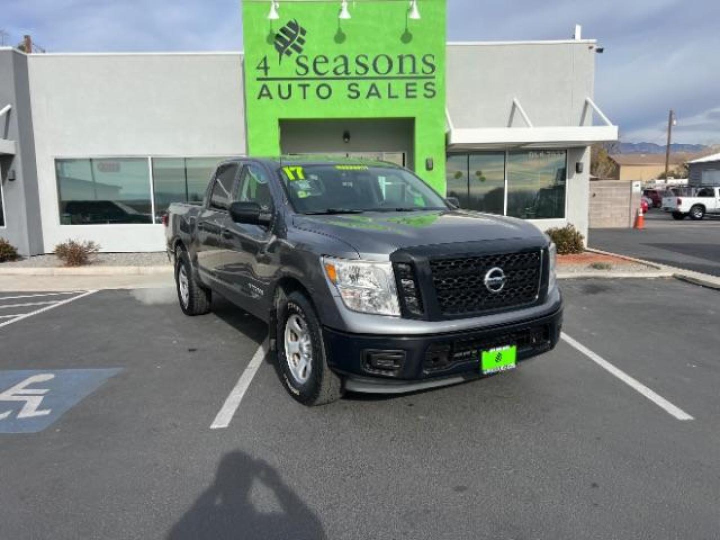 2017 Gun Metallic /Black, cloth Nissan Titan S Crew Cab 4WD (1N6AA1EJ6HN) with an 5.6L V8 DOHC 32V engine, 6-Speed Automatic transmission, located at 940 North Main Street, Cedar City, UT, 84720, (435) 628-0023, 37.692936, -113.061897 - We specialize in helping ALL people get the best financing available. No matter your credit score, good, bad or none we can get you an amazing rate. Had a bankruptcy, divorce, or repossessions? We give you the green light to get your credit back on the road. Low down and affordable payments that fit - Photo#0