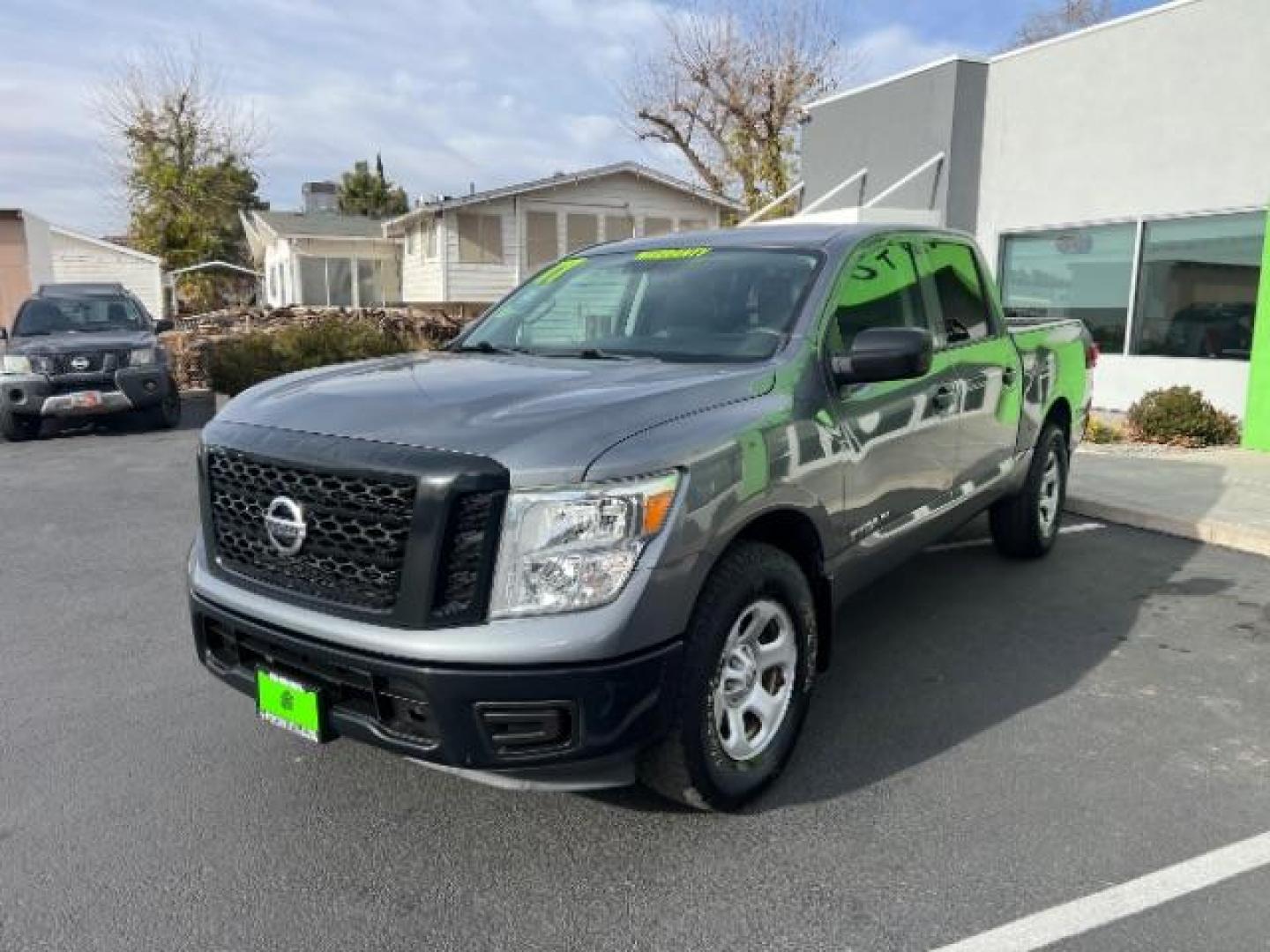 2017 Gun Metallic /Black, cloth Nissan Titan S Crew Cab 4WD (1N6AA1EJ6HN) with an 5.6L V8 DOHC 32V engine, 6-Speed Automatic transmission, located at 940 North Main Street, Cedar City, UT, 84720, (435) 628-0023, 37.692936, -113.061897 - Photo#2