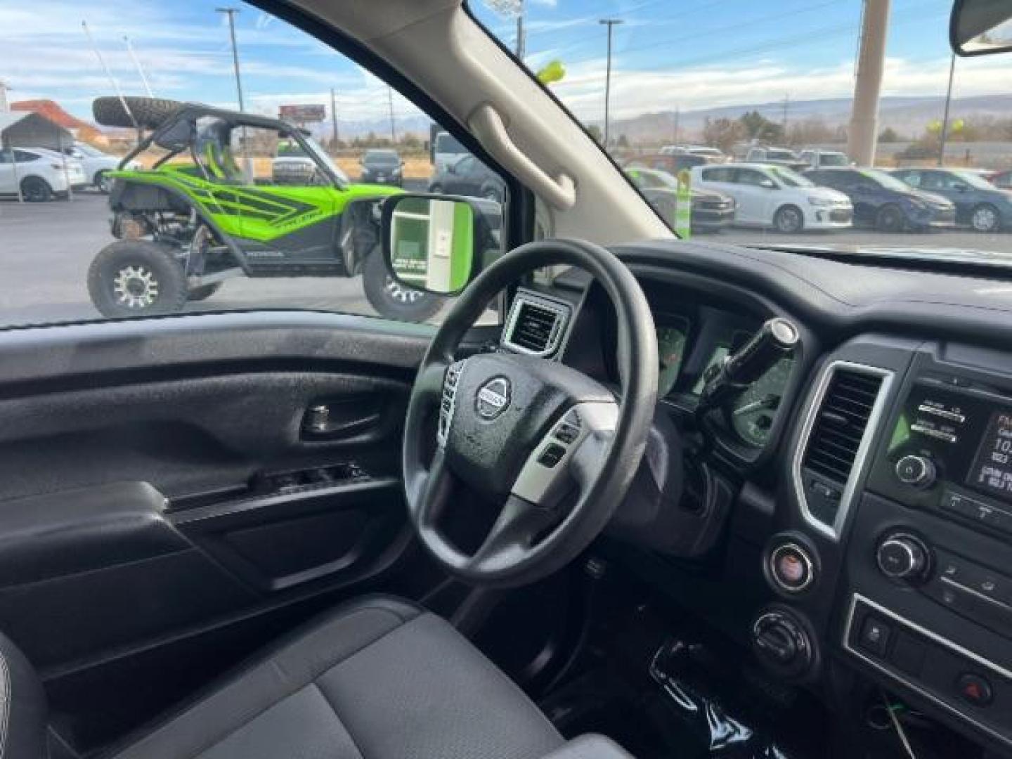 2017 Gun Metallic /Black, cloth Nissan Titan S Crew Cab 4WD (1N6AA1EJ6HN) with an 5.6L V8 DOHC 32V engine, 6-Speed Automatic transmission, located at 940 North Main Street, Cedar City, UT, 84720, (435) 628-0023, 37.692936, -113.061897 - Photo#30