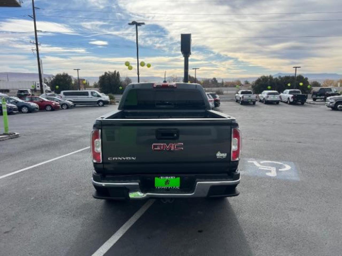 2016 Cyber Gray Metallic /Cocoa/Dune, leather GMC Canyon SLT Crew Cab 2WD (1GTG5DE36G1) with an 3.6L V6 DOHC 24V engine, 6-Speed Automatic transmission, located at 1865 East Red Hills Pkwy, St. George, 84770, (435) 628-0023, 37.120850, -113.543640 - Photo#5