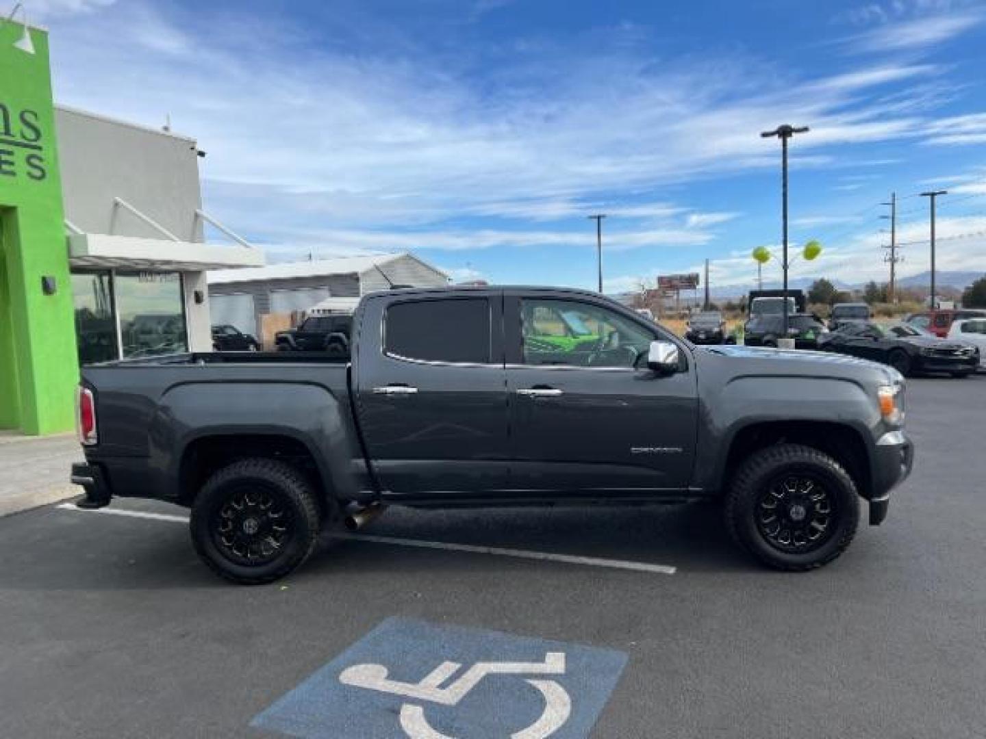 2016 Cyber Gray Metallic /Cocoa/Dune, leather GMC Canyon SLT Crew Cab 2WD (1GTG5DE36G1) with an 3.6L V6 DOHC 24V engine, 6-Speed Automatic transmission, located at 1865 East Red Hills Pkwy, St. George, 84770, (435) 628-0023, 37.120850, -113.543640 - Photo#6