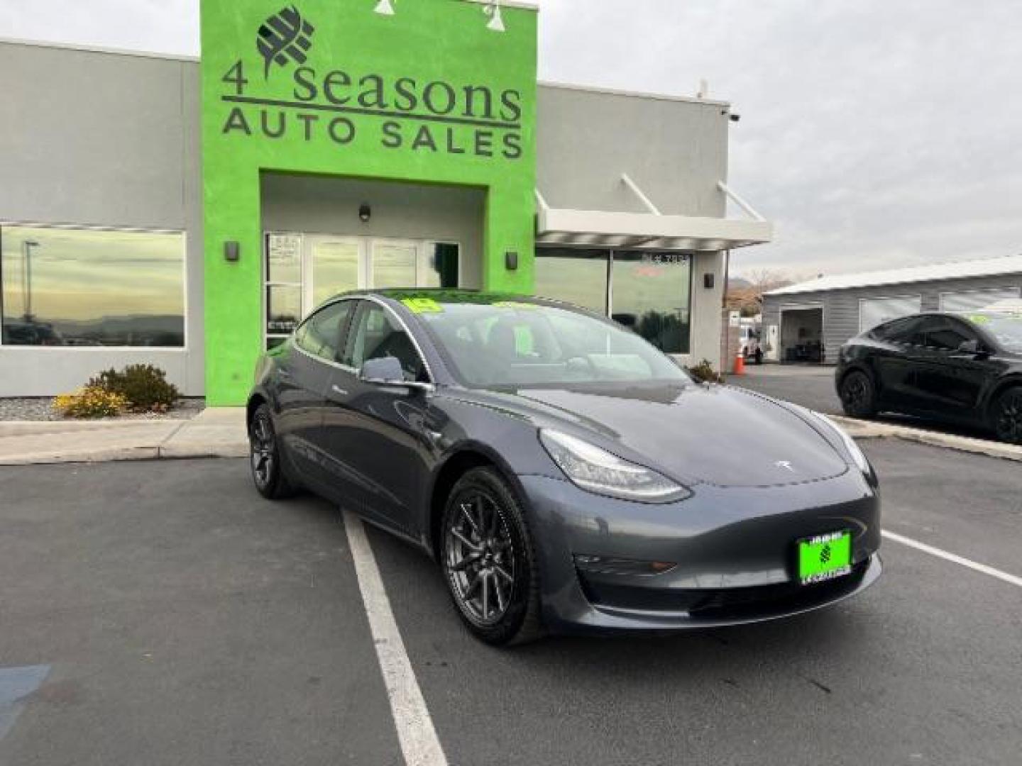 2019 Solid Black /All Black, leatherette Tesla Model 3 Long Range (5YJ3E1EA7KF) with an ELECTRIC engine, 1-Speed Automatic transmission, located at 1865 East Red Hills Pkwy, St. George, 84770, (435) 628-0023, 37.120850, -113.543640 - Get additional $4k off listed price with the IRS EV tax rebate. We can file for you and get funds in 72hours. This Model 3 Long Range RWD is in great condition and gets 290 miles on a full charge. Full battery and motor warranty until 8years or 120k miles. Stop by and see it at 4 Seasons Auto in - Photo#0