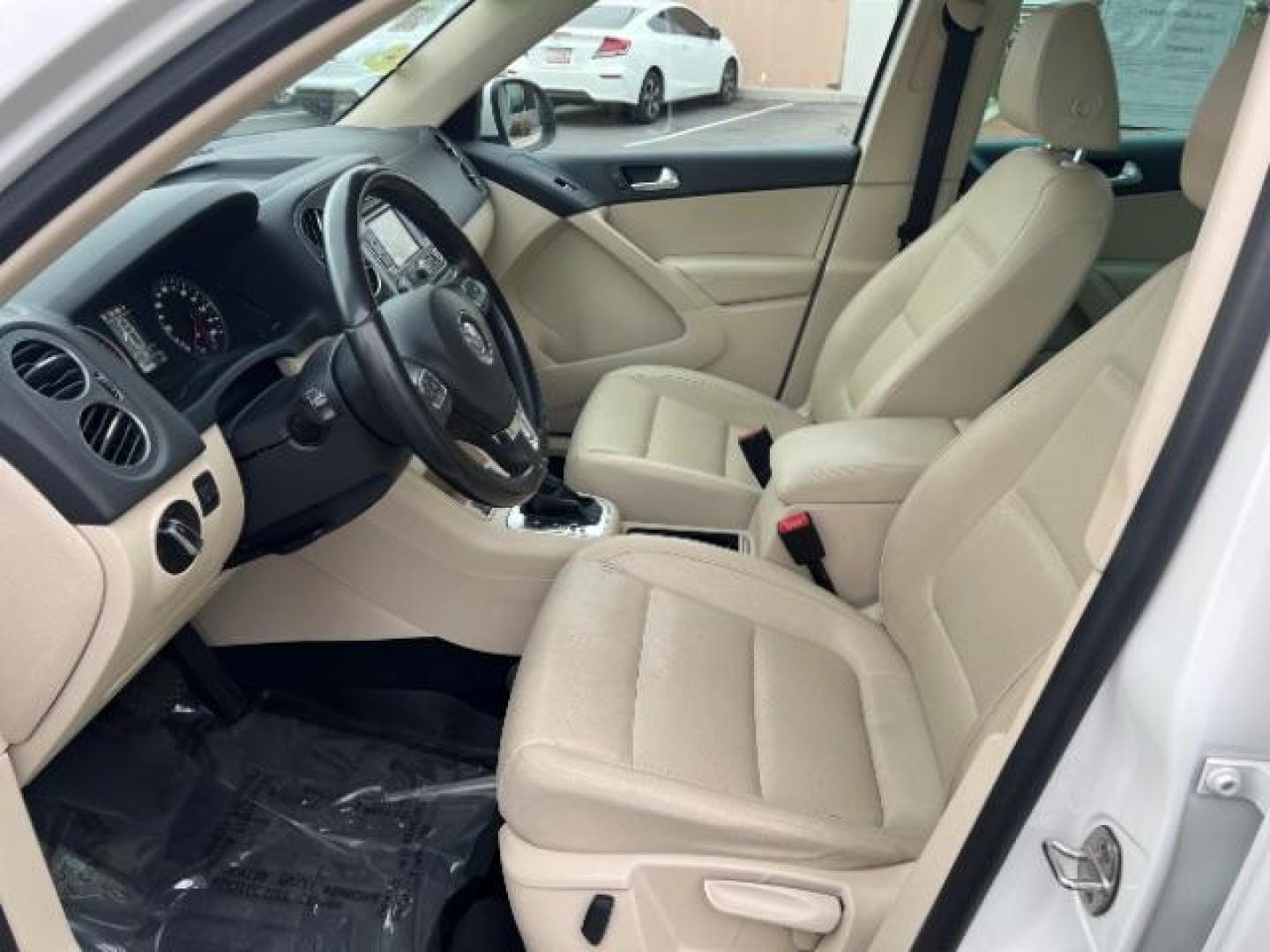 2012 Candy White /Desert Beige Leather Volkswagen Tiguan S 4Motion (WVGBV7AX6CW) with an 2.0L L4 DOHC 16V TURBO engine, 6-Speed Automatic transmission, located at 1865 East Red Hills Pkwy, St. George, 84770, (435) 628-0023, 37.120850, -113.543640 - Photo#16