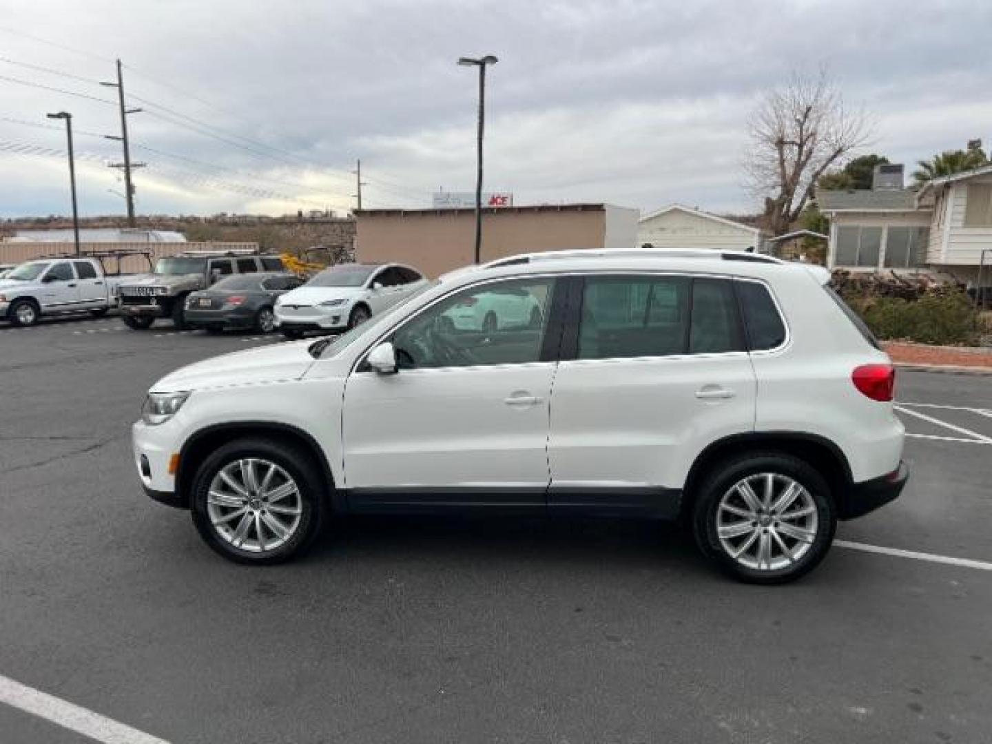 2012 Candy White /Desert Beige Leather Volkswagen Tiguan S 4Motion (WVGBV7AX6CW) with an 2.0L L4 DOHC 16V TURBO engine, 6-Speed Automatic transmission, located at 1865 East Red Hills Pkwy, St. George, 84770, (435) 628-0023, 37.120850, -113.543640 - Photo#3