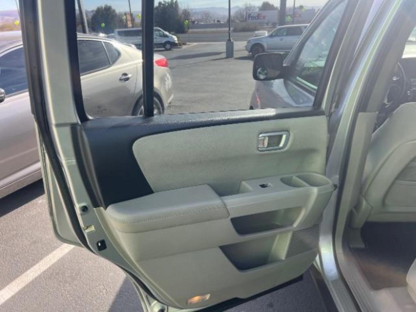 2011 Alabaster Silver Metallic /Black Cloth Interior Honda Pilot LX 2WD 5-Spd AT (5FNYF3H25BB) with an 3.5L V6 SOHC 24V engine, 5-Speed Automatic transmission, located at 1865 East Red Hills Pkwy, St. George, 84770, (435) 628-0023, 37.120850, -113.543640 - We specialize in helping ALL people get the best financing available. No matter your credit score, good, bad or none we can get you an amazing rate. Had a bankruptcy, divorce, or repossessions? We give you the green light to get your credit back on the road. Low down and affordable payments that fit - Photo#19